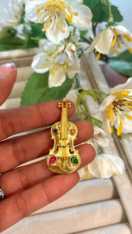 Guitar designer brooch