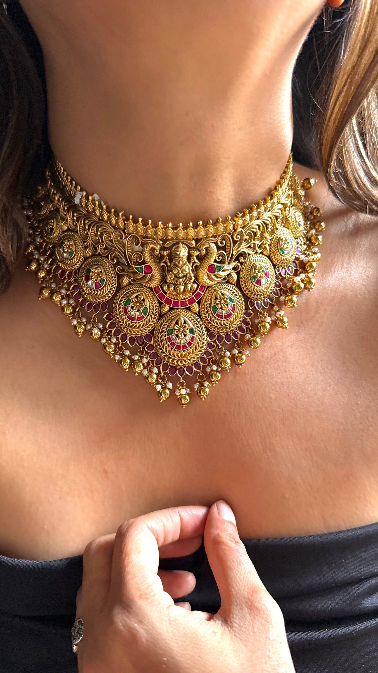 Goddess Laxmi inspired temple jewellery with peacock motif