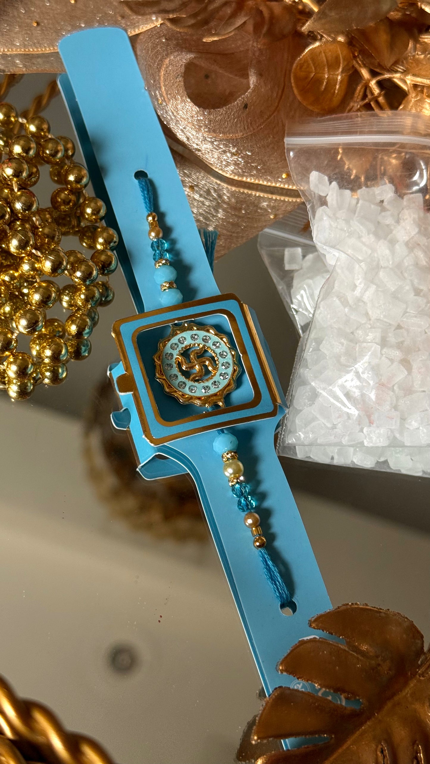 Swastik Rakhi (sapphire)
