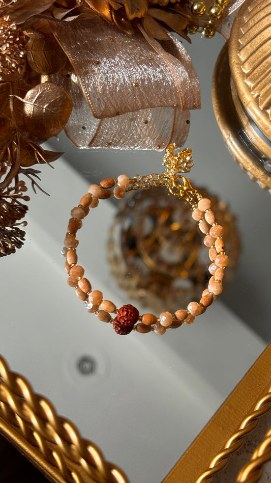 Rudraksh & chandan rakhi bracelet ( shipping will be extra )