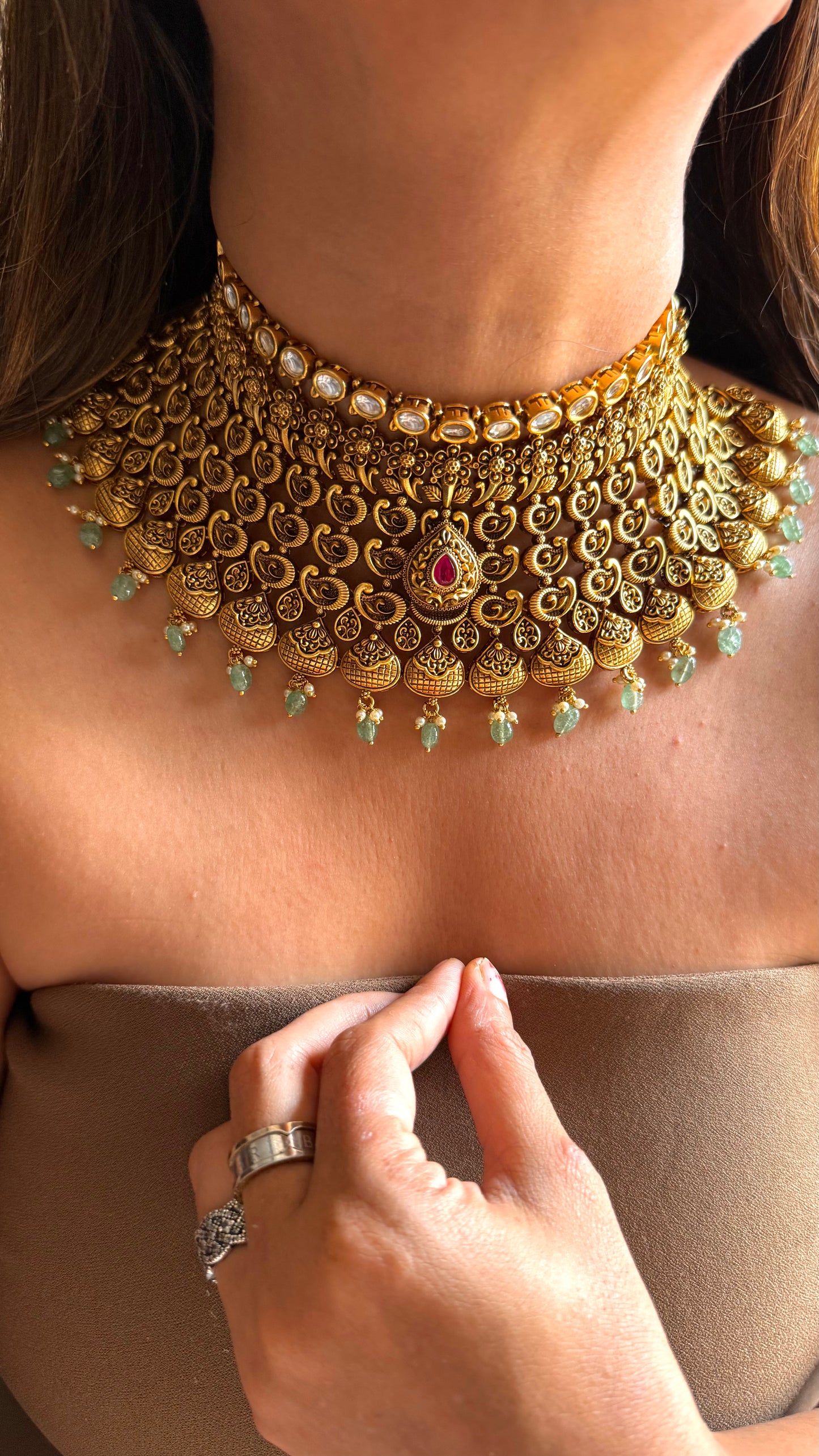Ambi nakshi oxidised gold choker with ruby and mint detailing