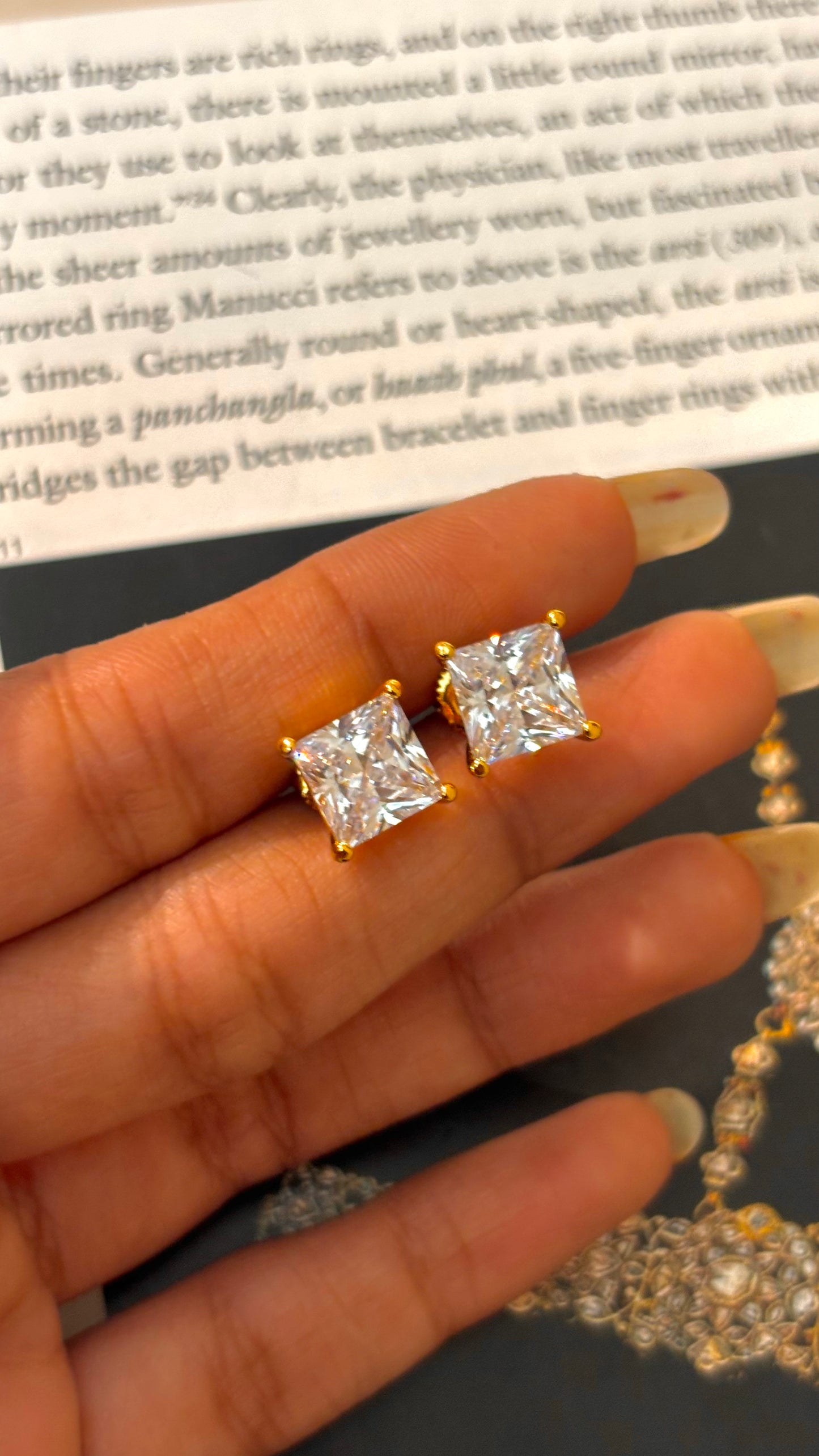 Emerald cut 2 carat gold studs