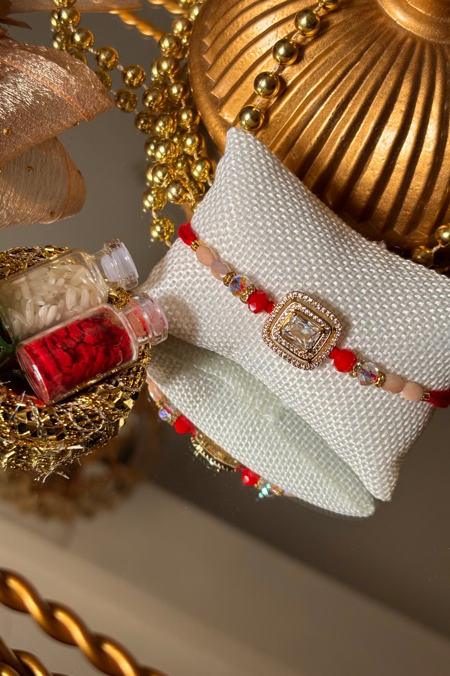Diamond polki red rakhi ( shipping will be extra )