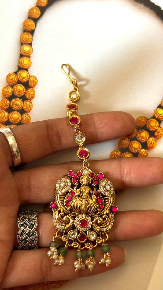 Rani pink ruby with goddess Laxmi Maangtika