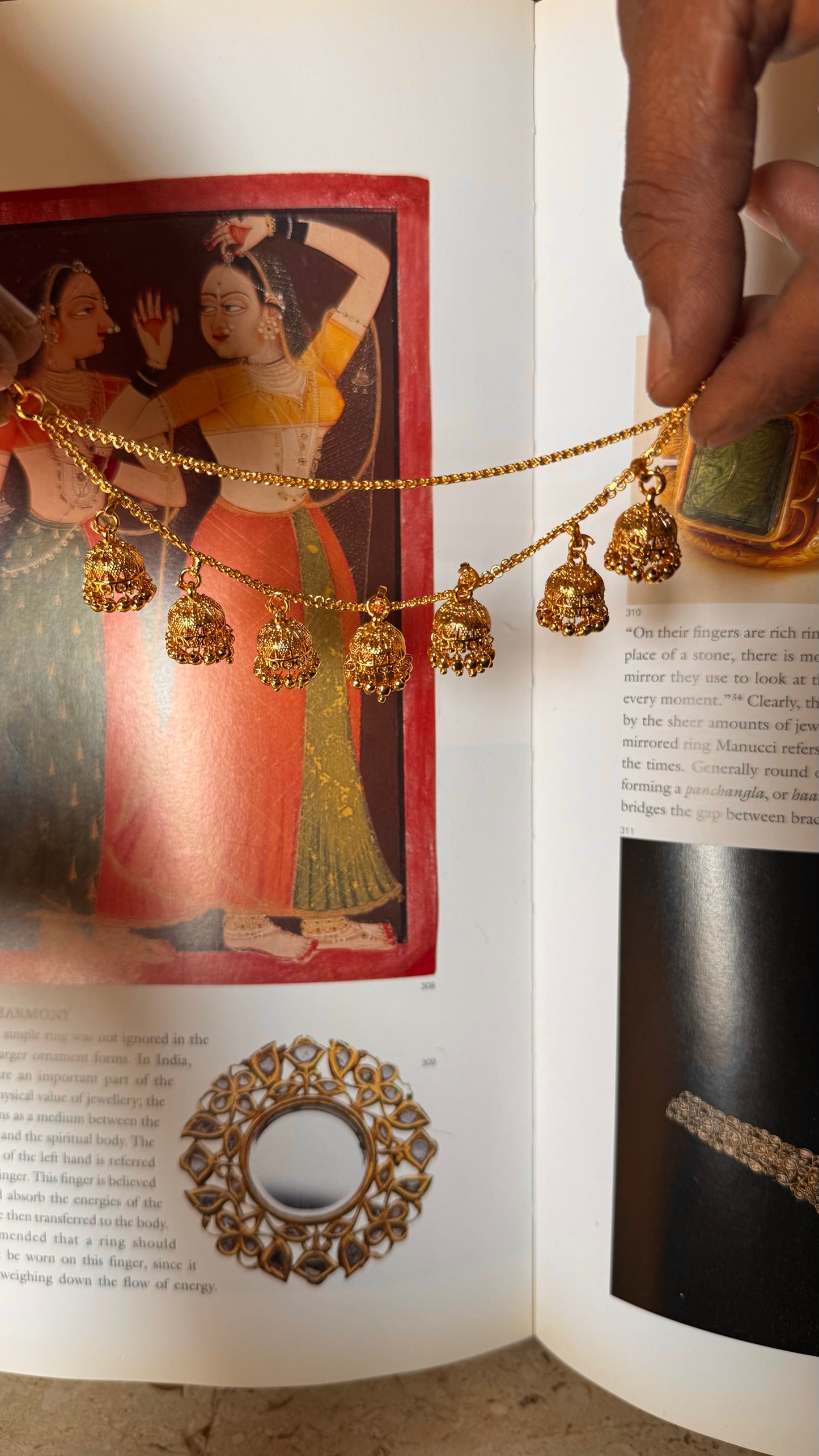 gold ear chain with jhumki detailing