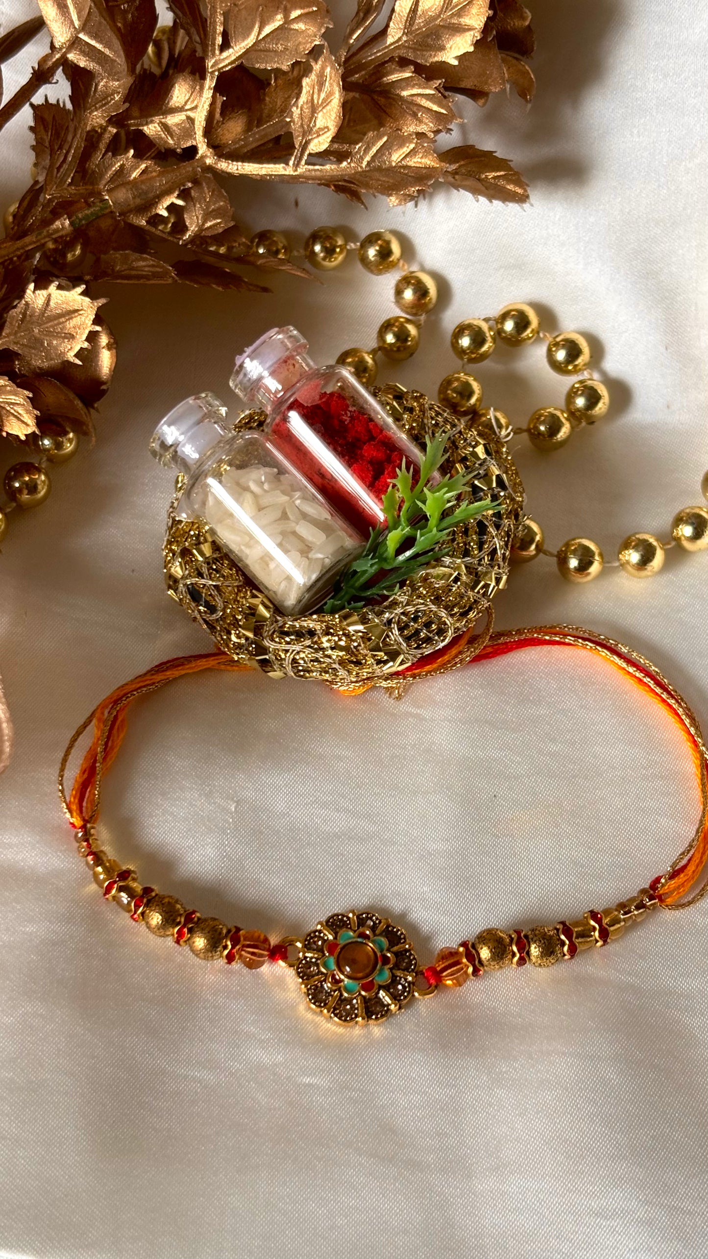 Floral hand painted nakashi oxidised gold Rakhi ( shipping will be extra )