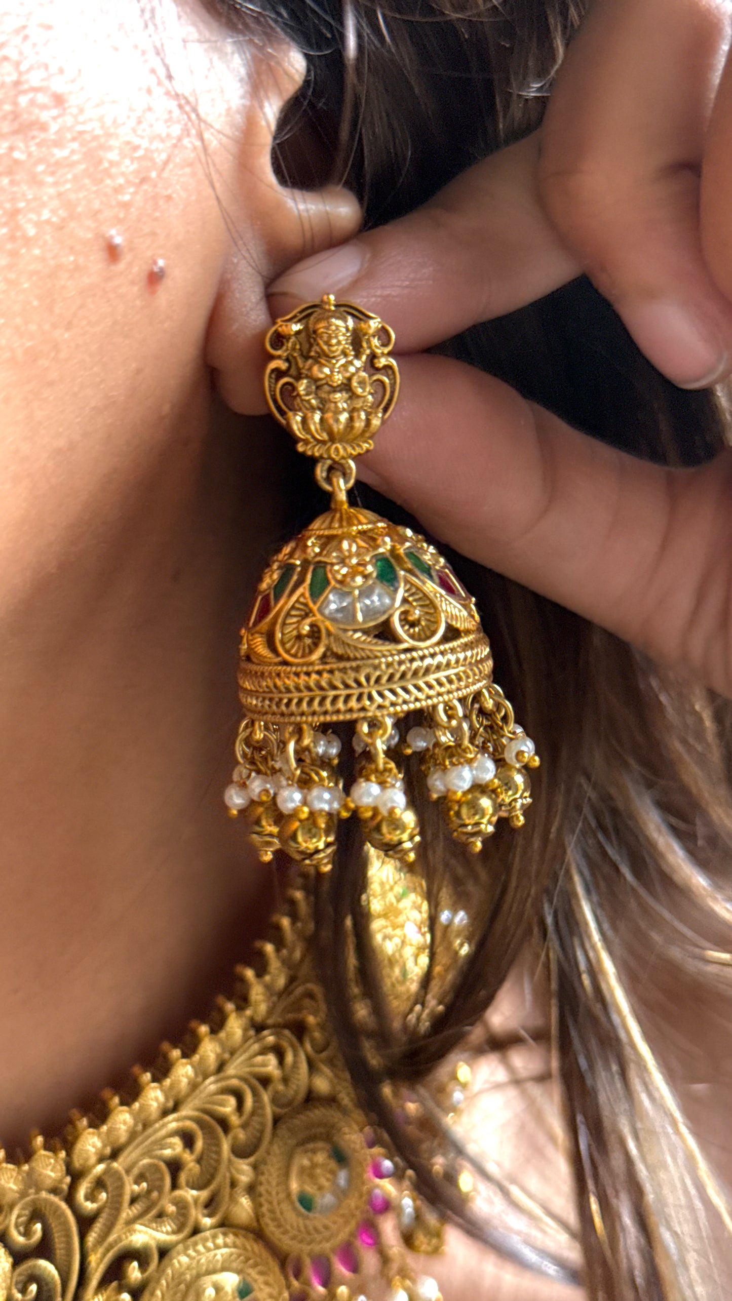 Goddess Laxmi inspired temple jewellery with peacock motif
