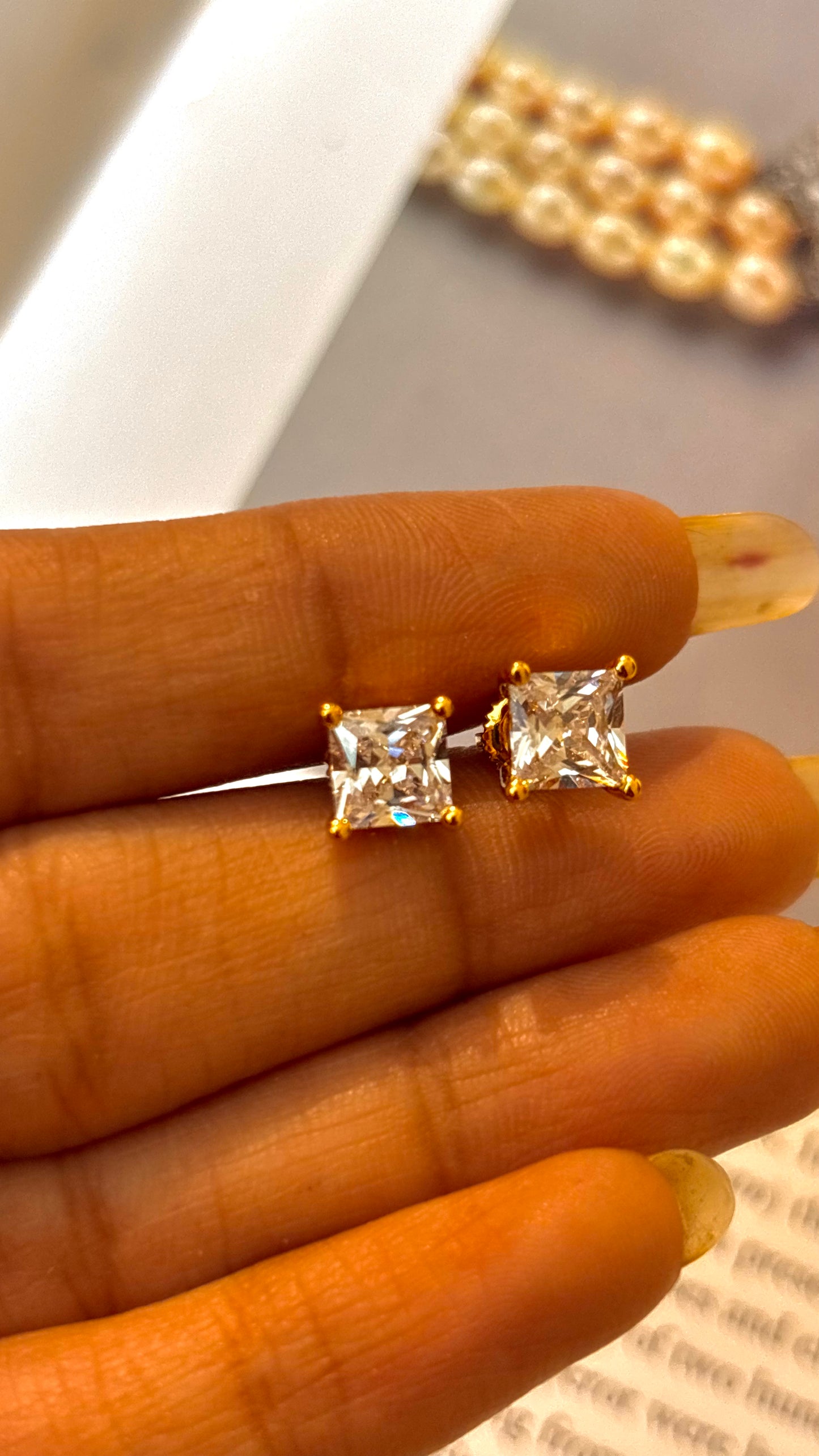 Emerald cut 1 carat gold studs
