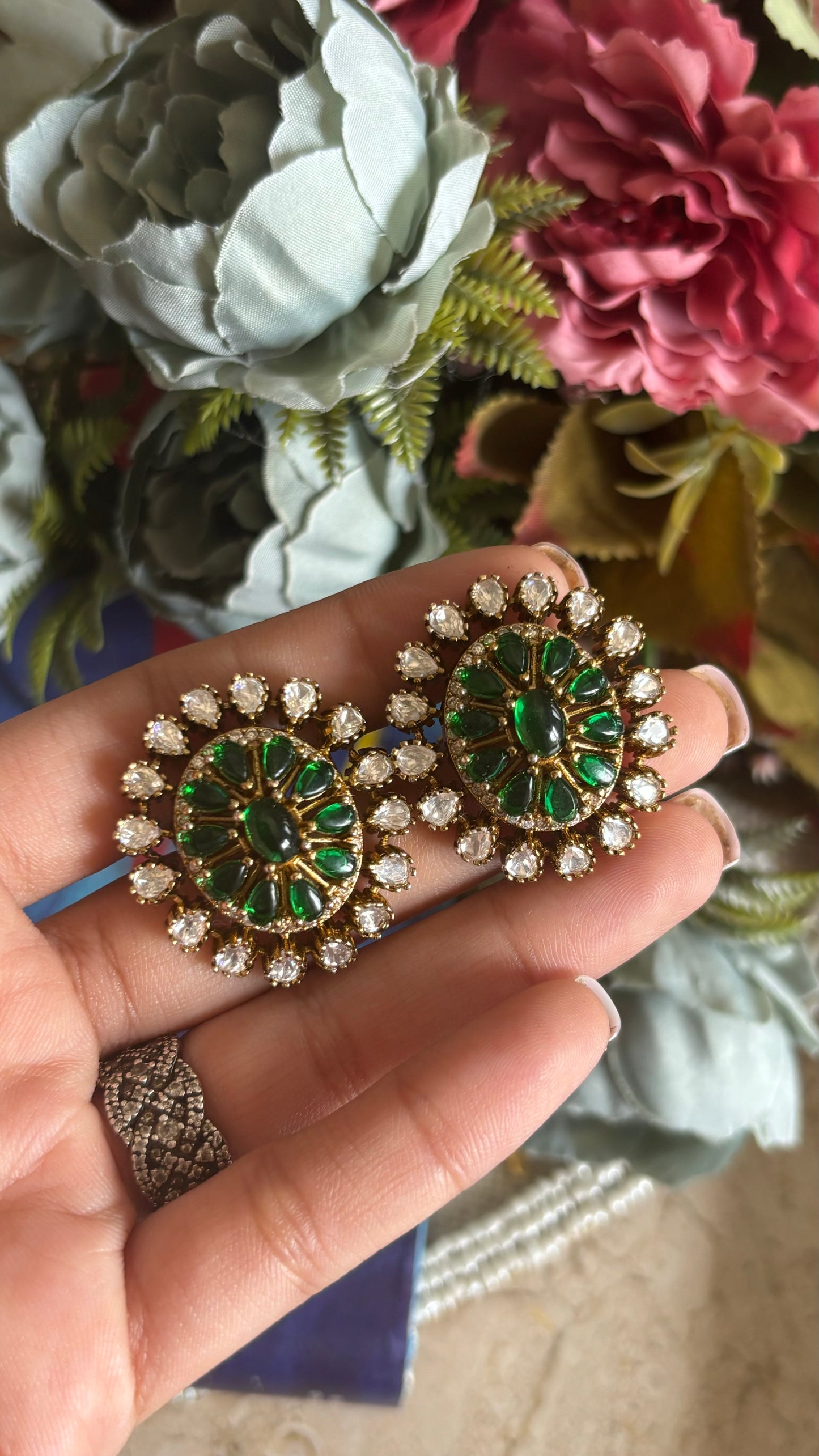 Emerald Moissanite oval shaped studs