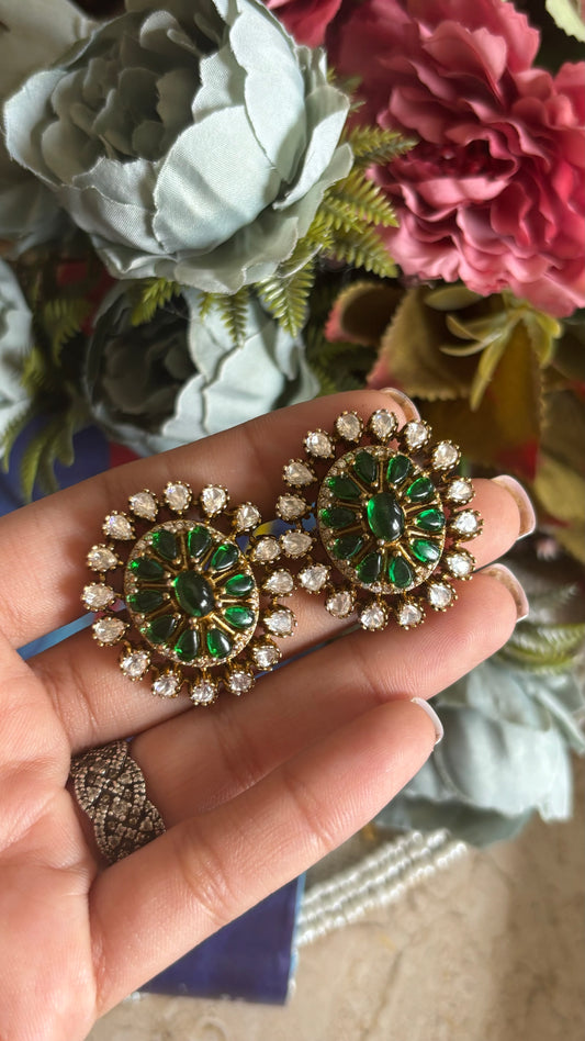 Emerald Moissanite oval shaped studs