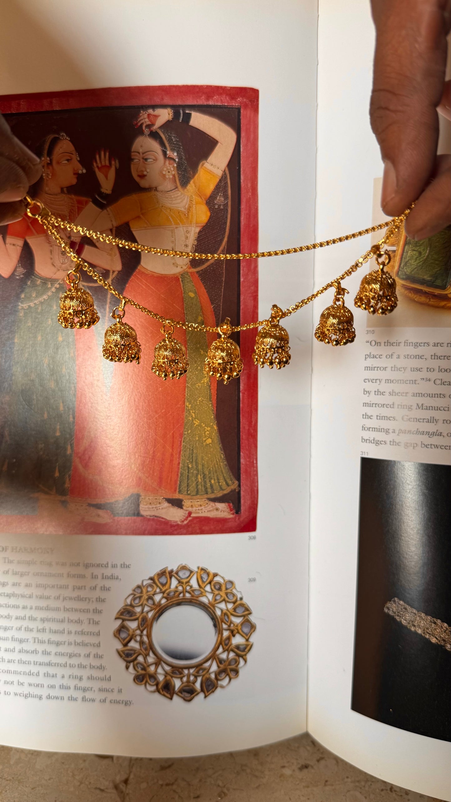 gold ear chain with jhumki detailing