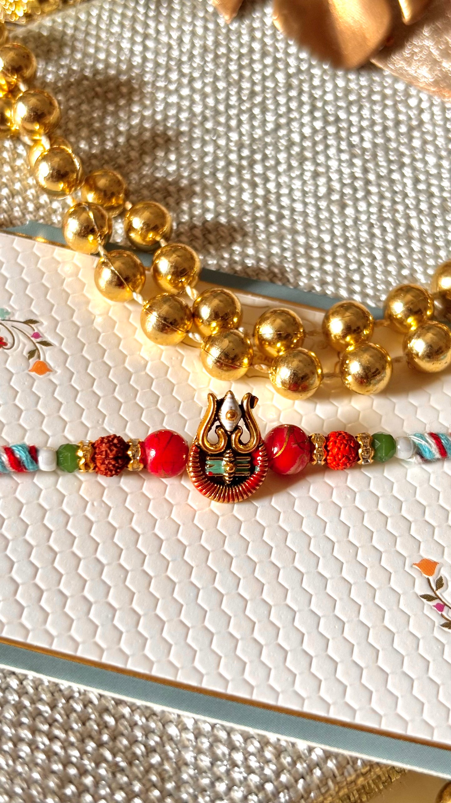 Lord shiva inspired rudraksh rakhi (red&blue) (shipping will be extra)