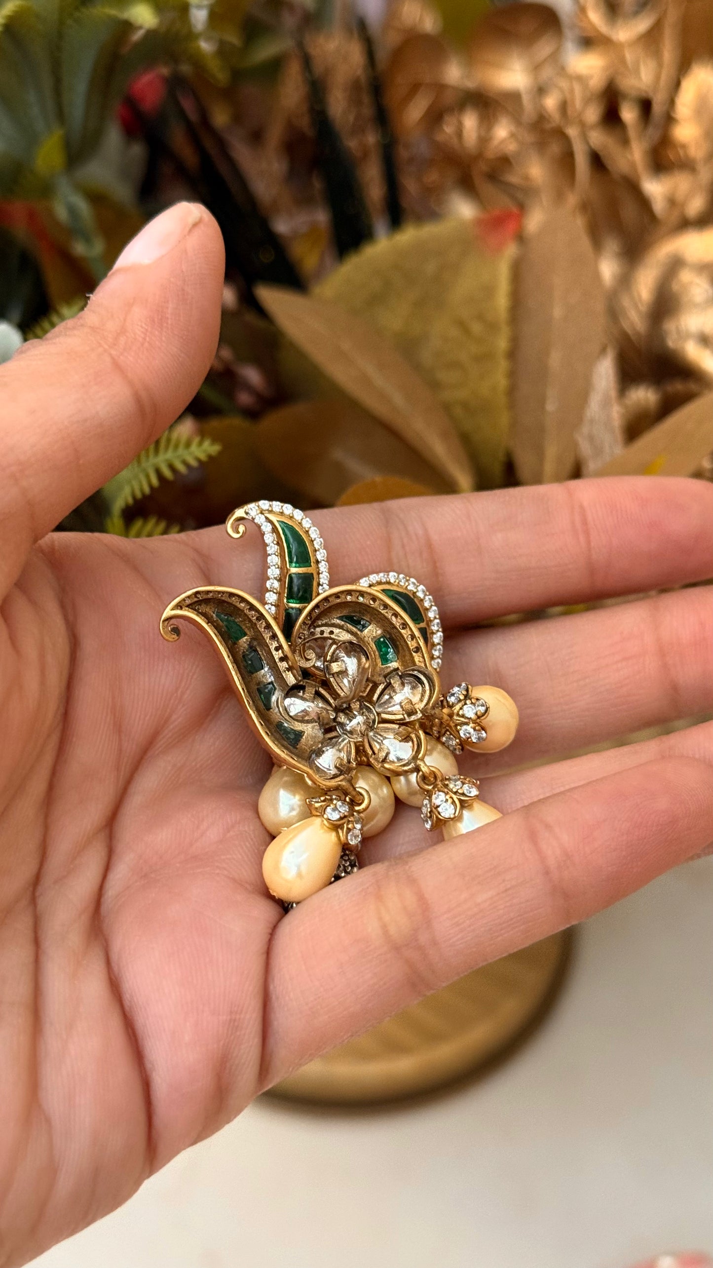 Designer emerald takkar studs with floral pearl detailing
