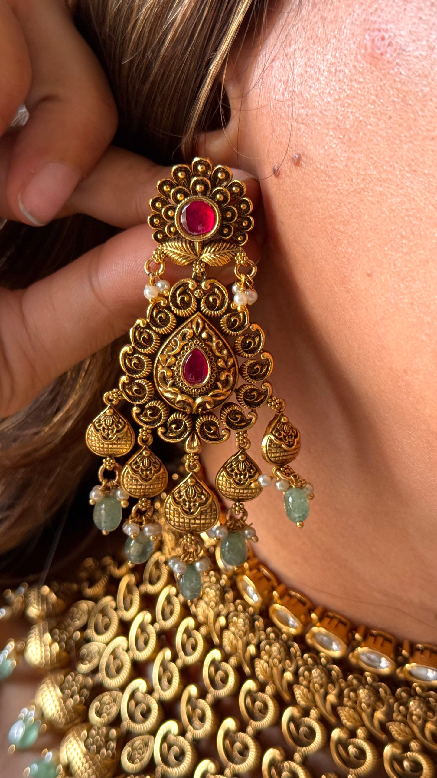 Ambi nakshi oxidised gold choker with ruby and mint detailing