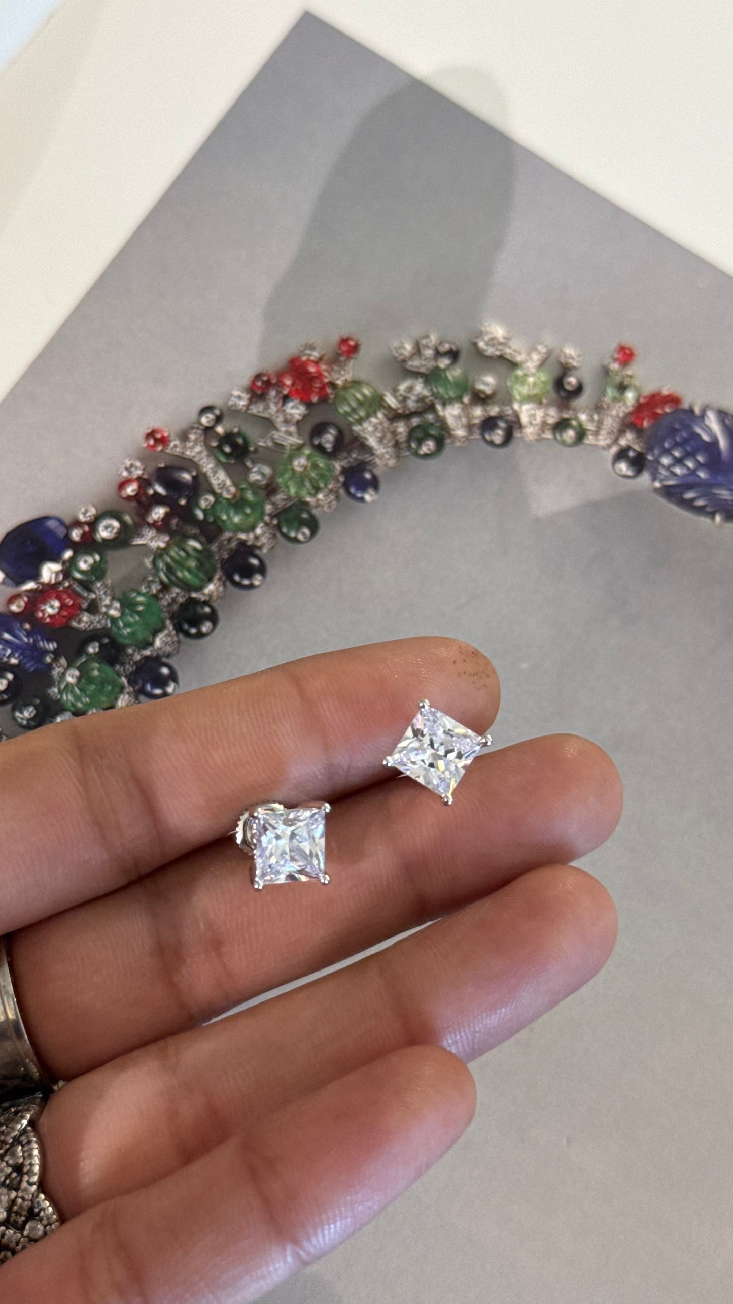 Rhodium Emerald cut diamond studs