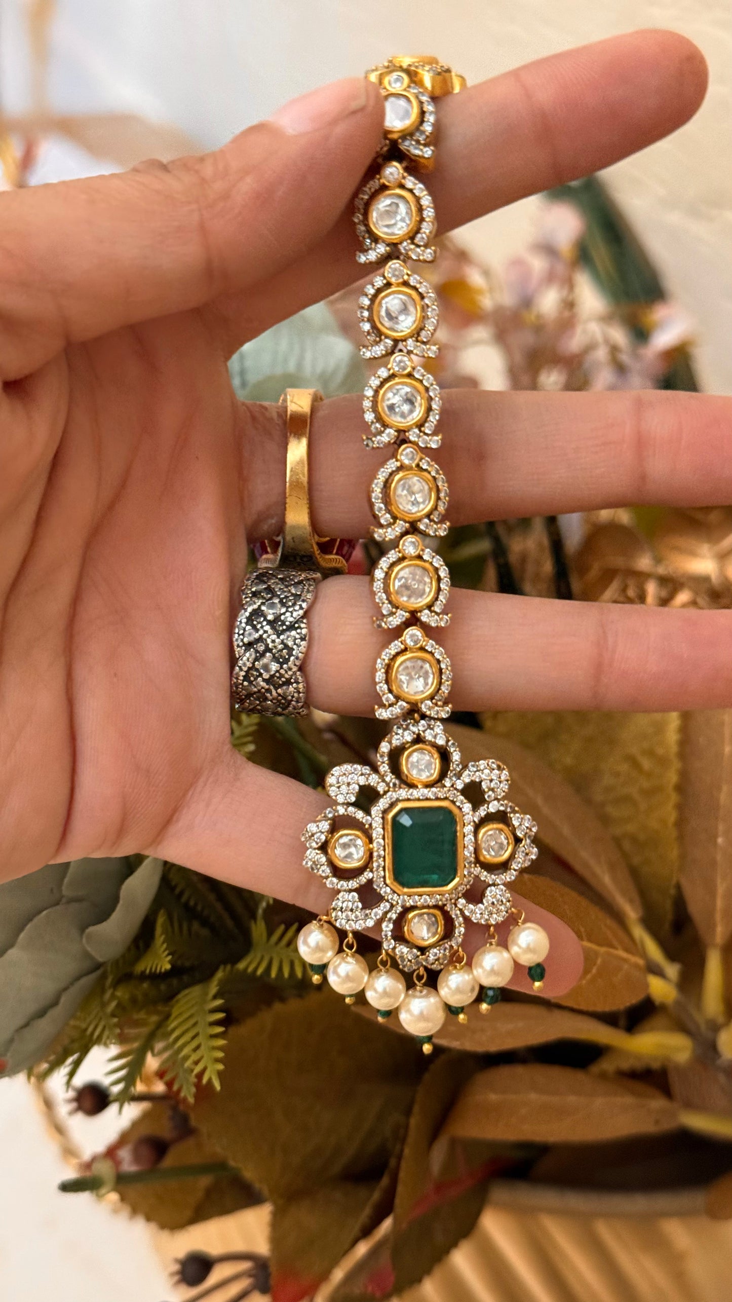 Emerald Polki maangtika with pearl detailing
