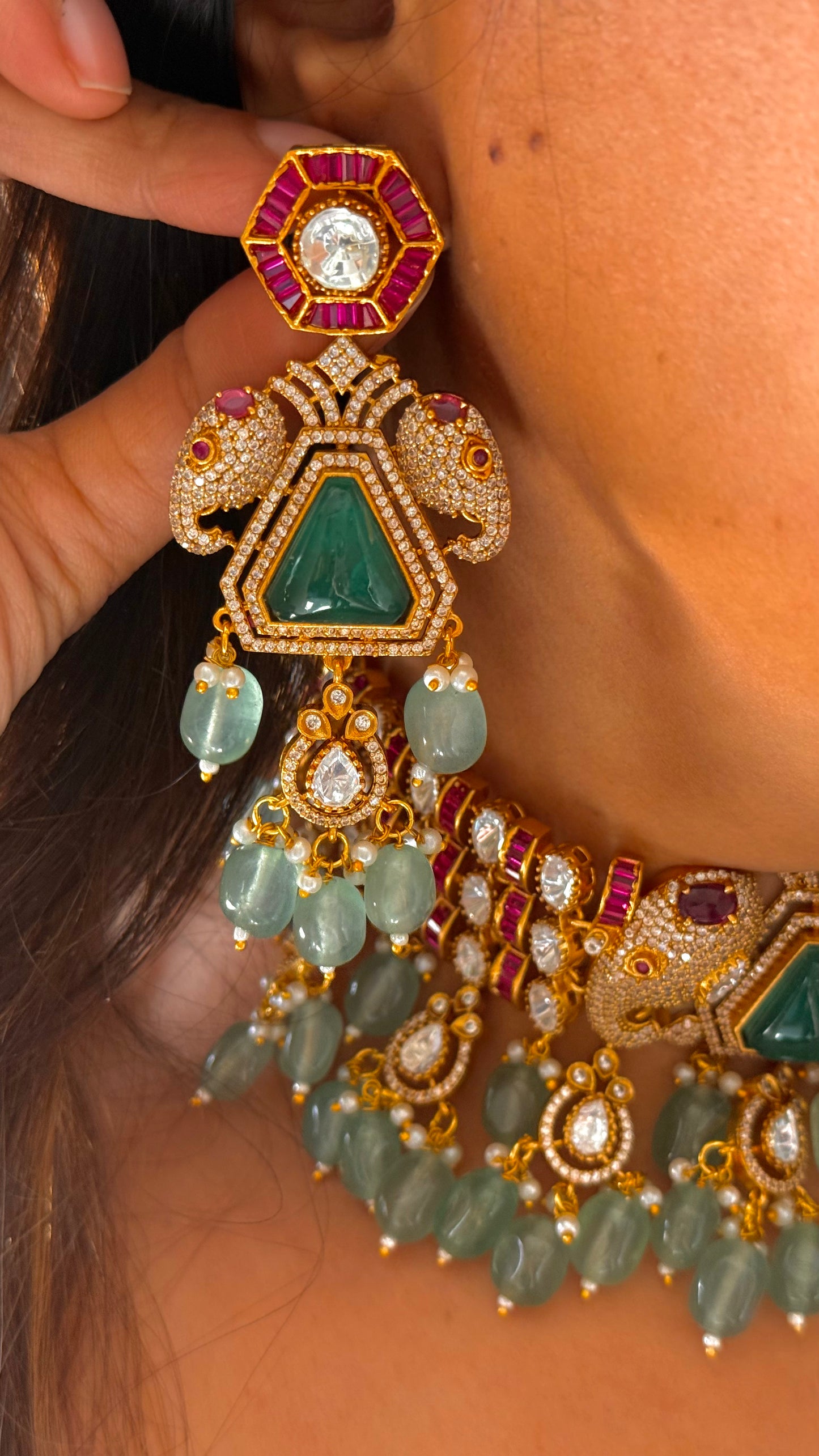 Gajanand emerald doublet and rani pink choker