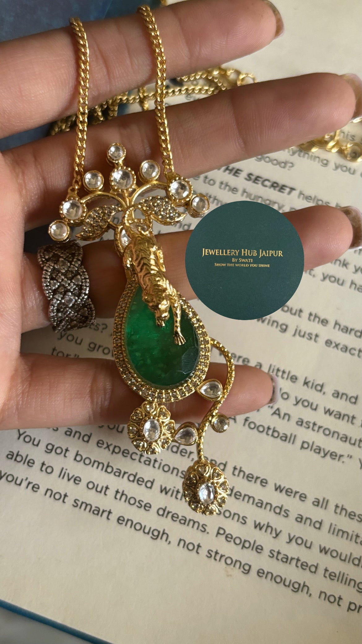 Emerald Sabyasachi tiger down pendant set