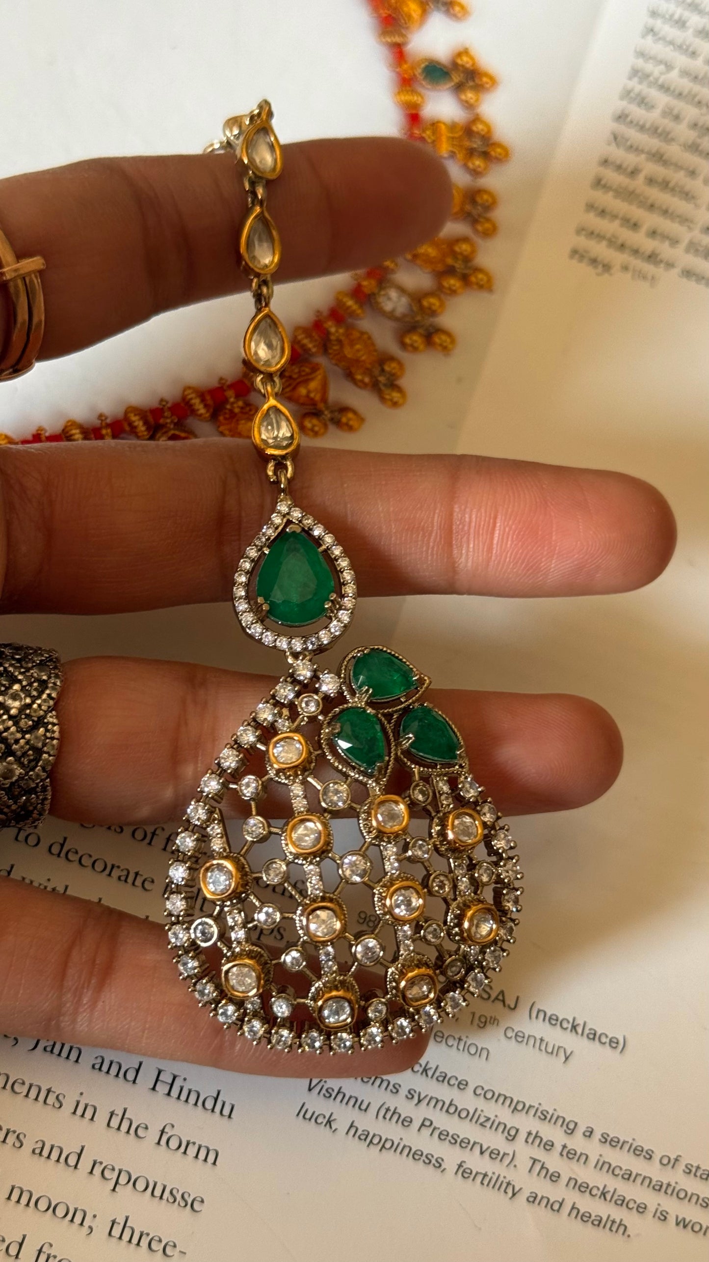 Emerald victorian maangtika with leaf pattern