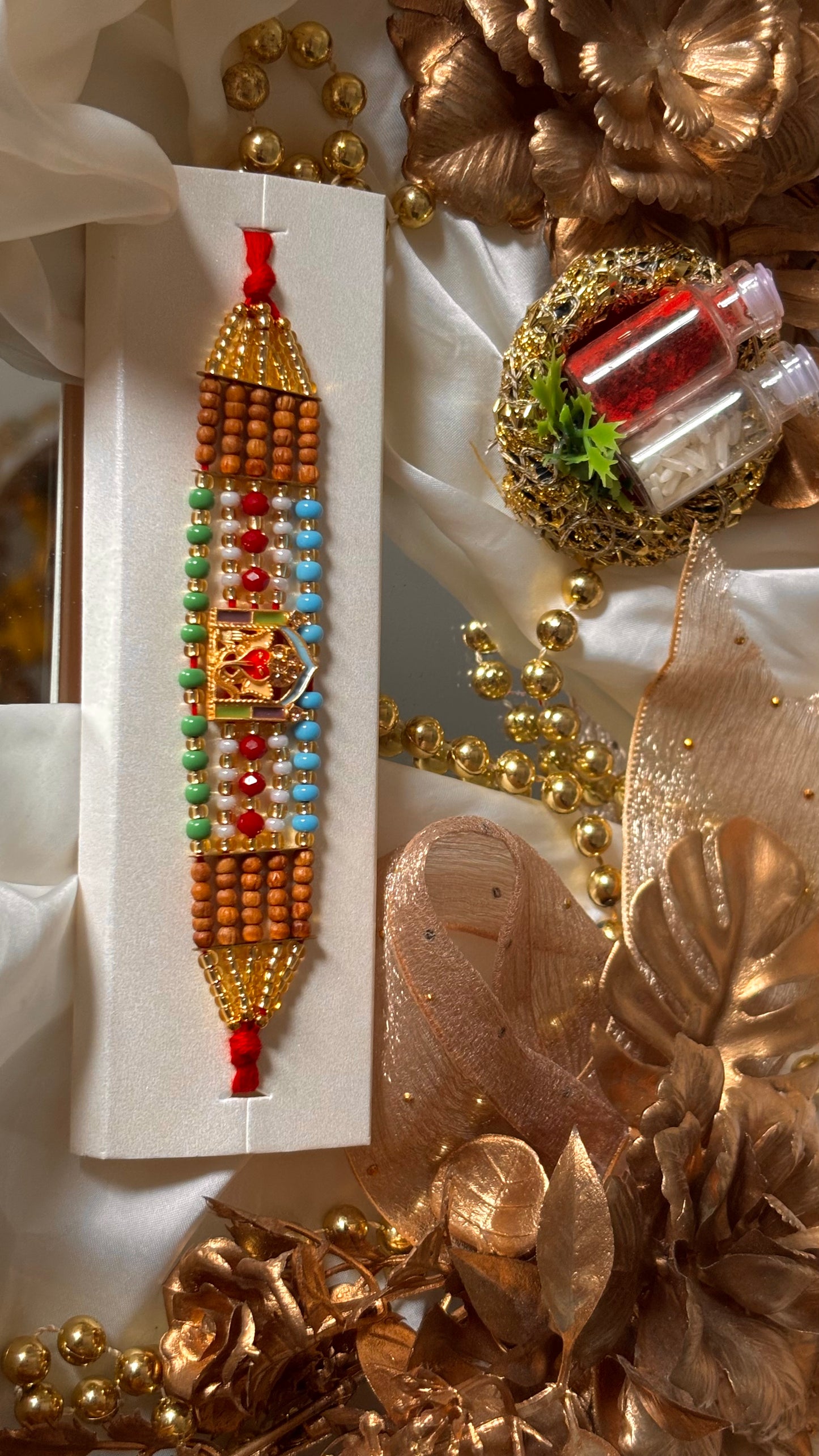Lord ganesha multicoloured rakhi ( shipping will be extra )