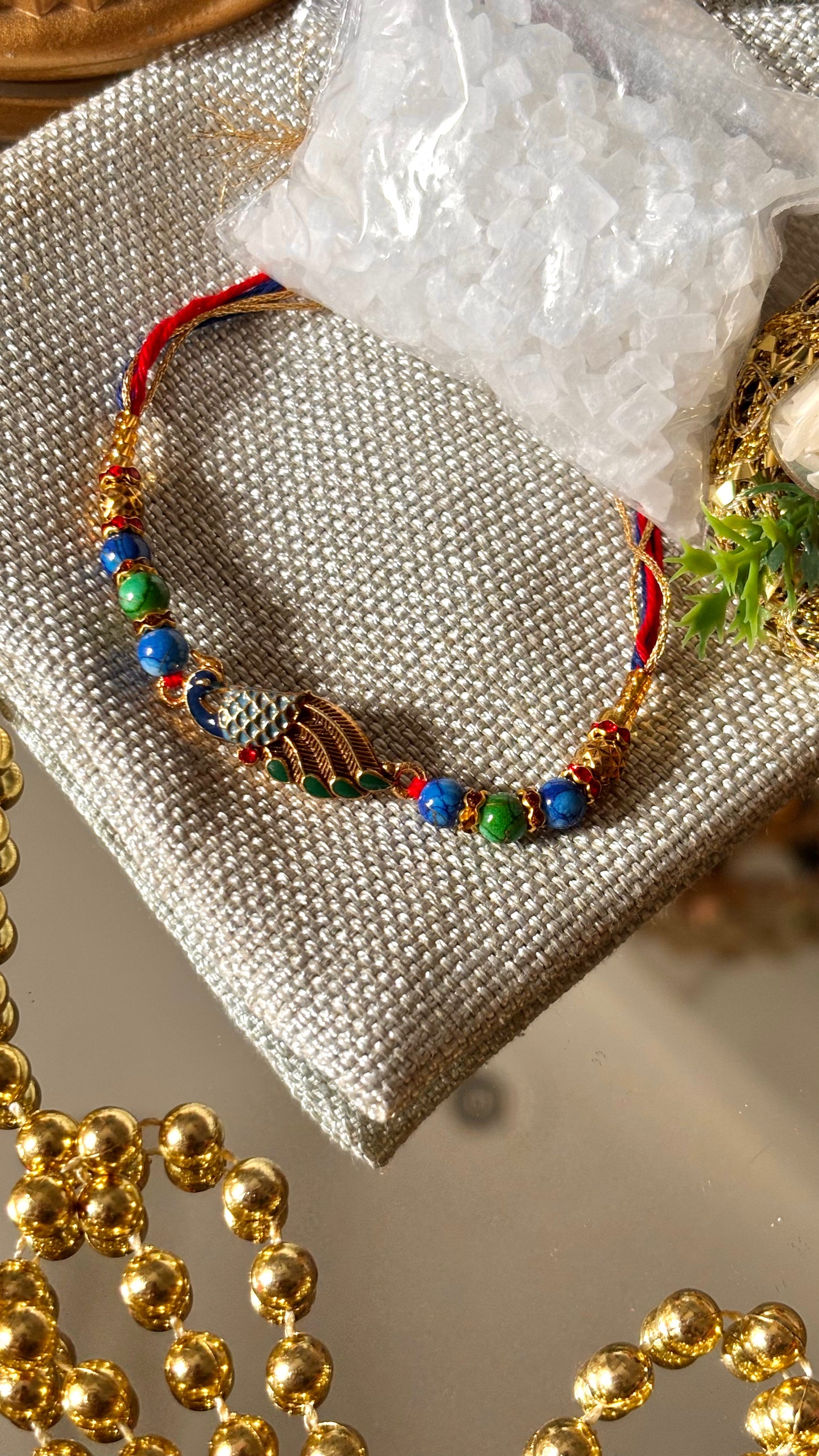 Peacock designer minimalist rakhi ( shipping will be extra )