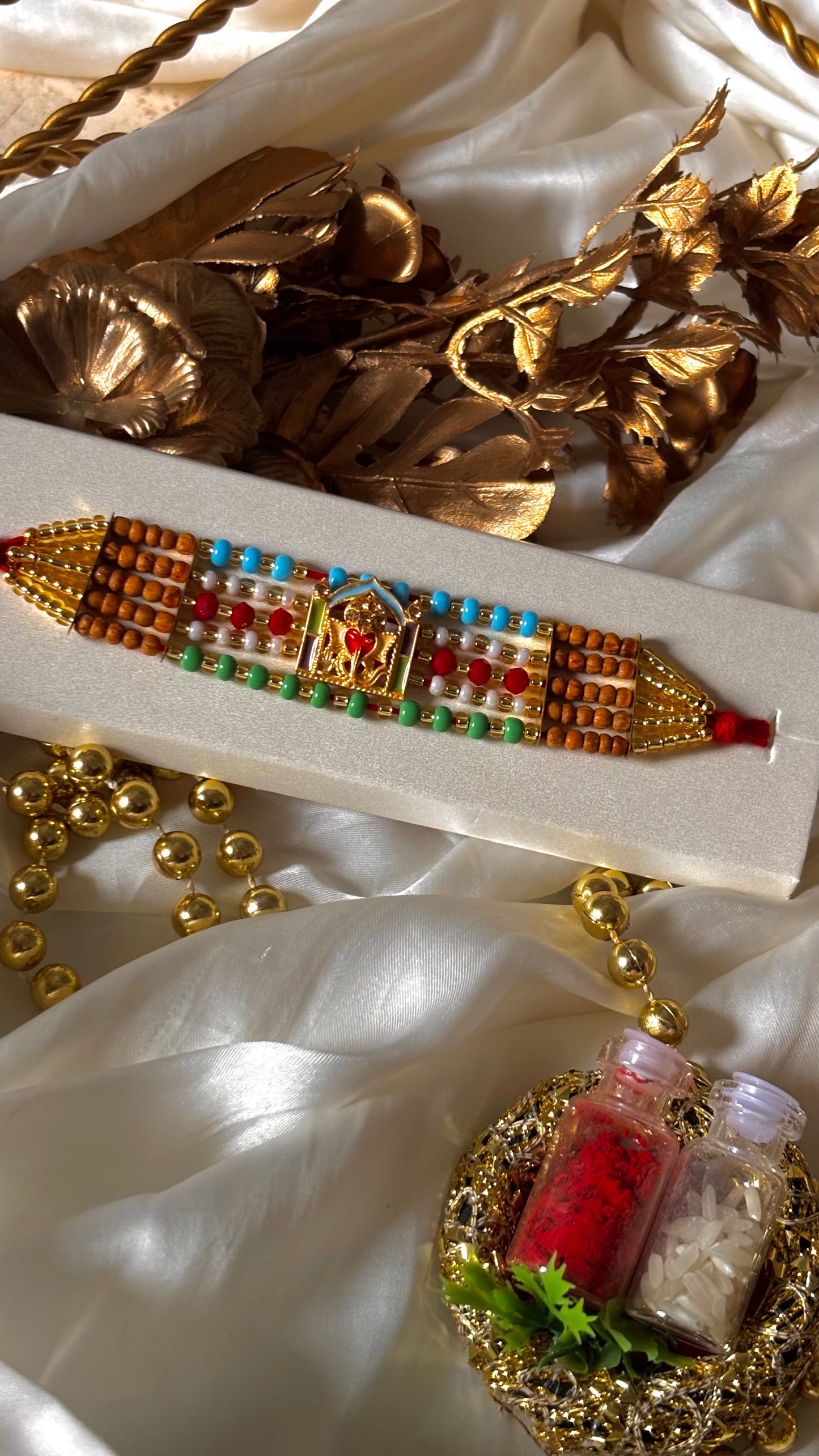 Lord ganesha multicoloured rakhi ( shipping will be extra )