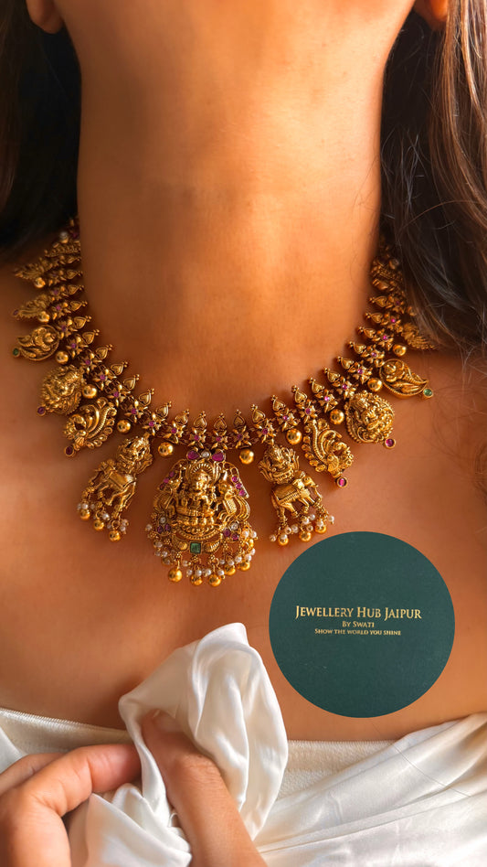 Goddess laxmi emerald & rani pink with peacock & elephant designed temple collar set