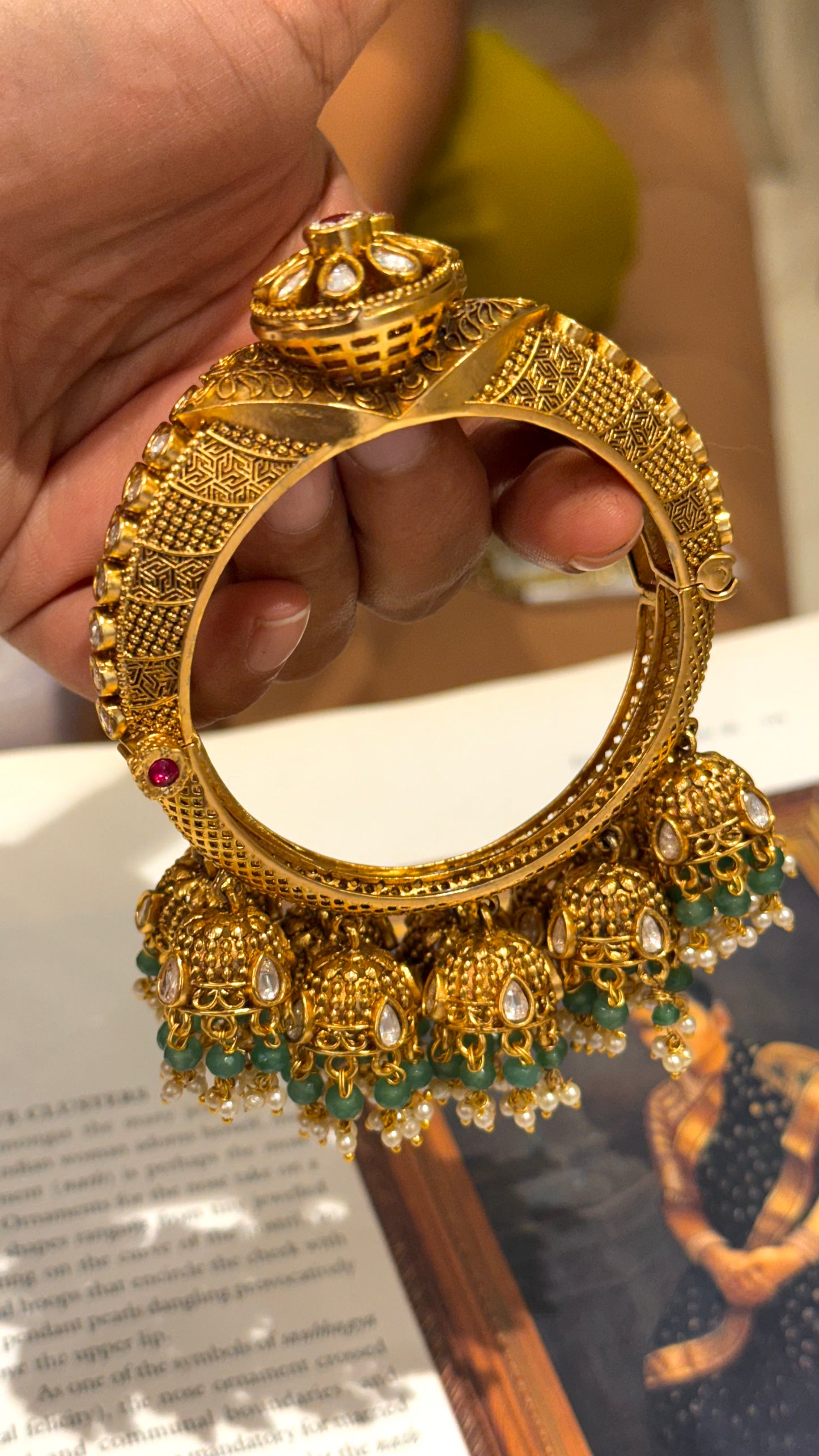 Rajwasa floral pattern bangles with rani pink stone and jhumki details