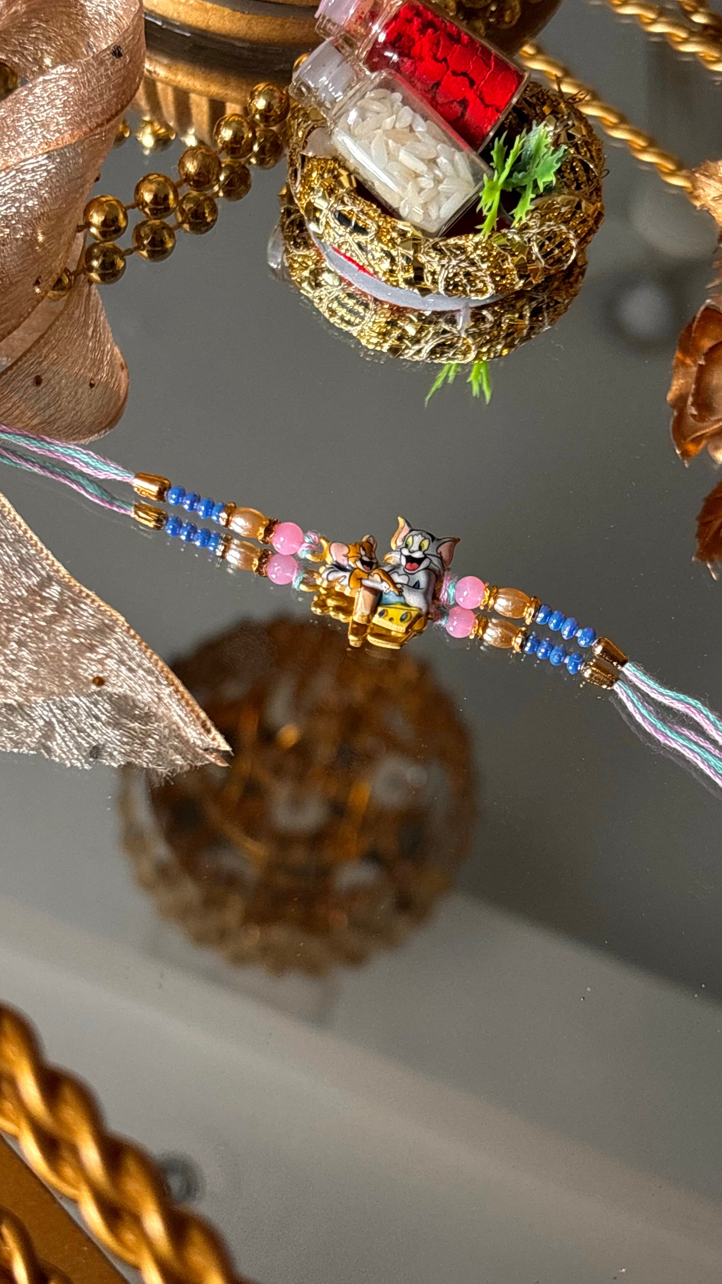 Tom & Jerry rakhi for kids ( shipping will be extra )