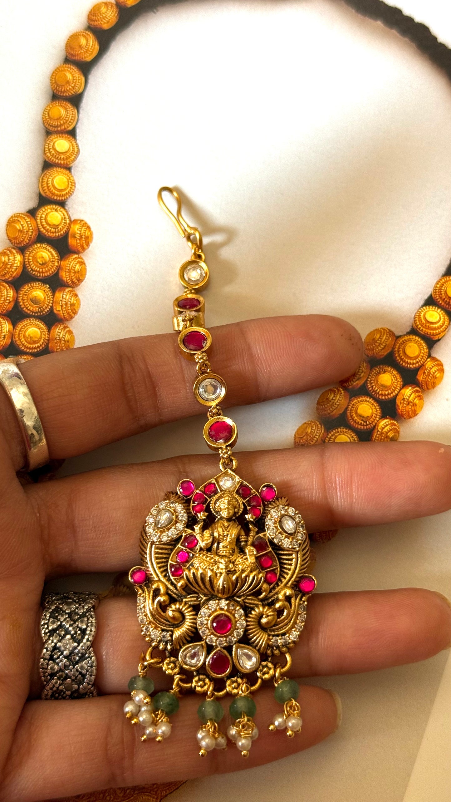 Rani pink ruby with goddess Laxmi Maangtika