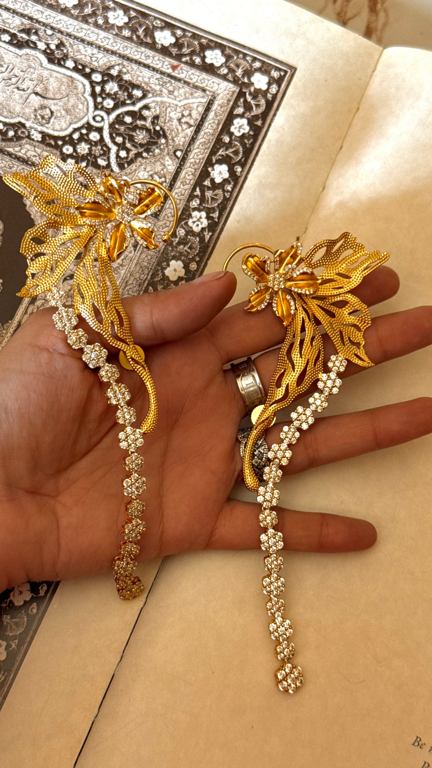 Designer Carnival ear cuff with floral diamond earrings