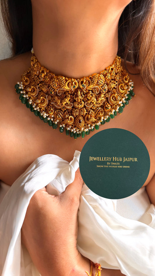 Goddess laxmi & rani pink peacock design with emerald & pearl drop temple choker set