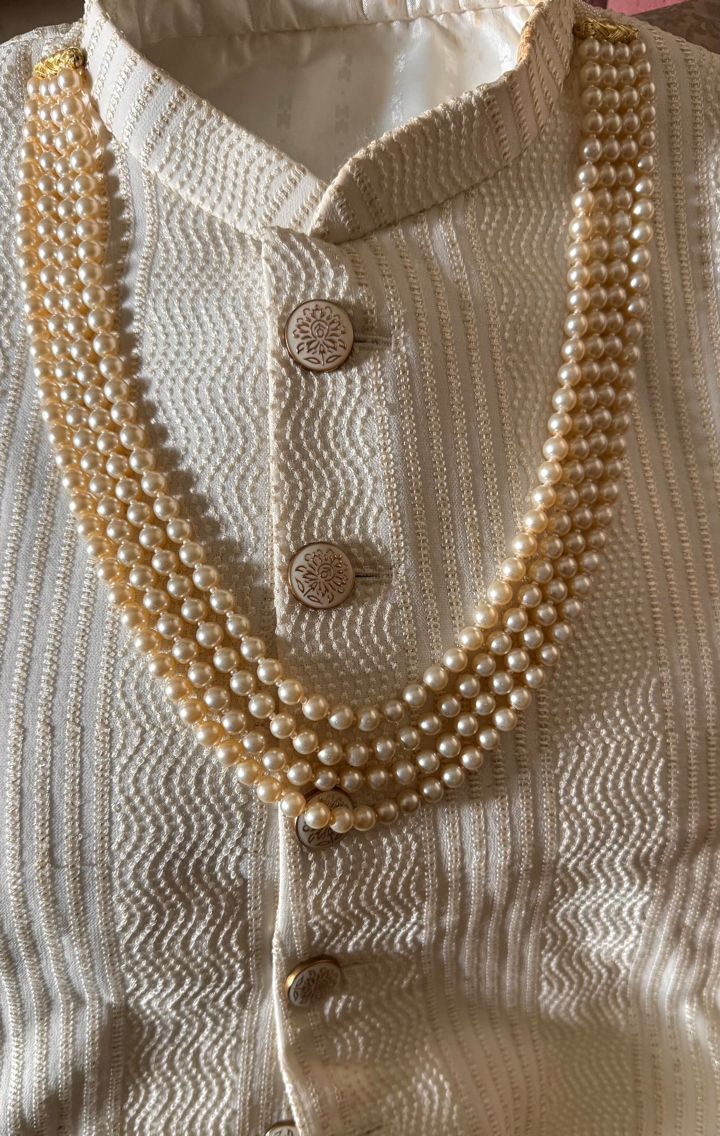 Four line off white Pearl string