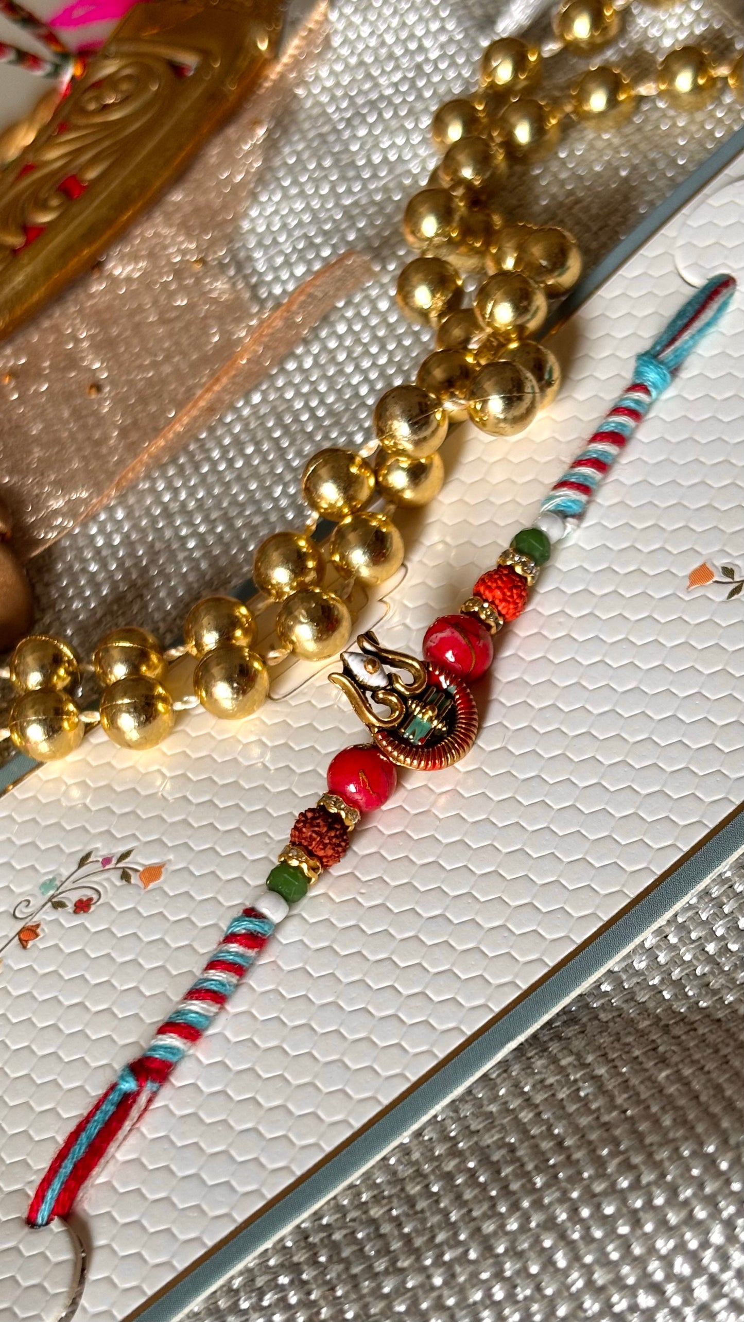Lord shiva inspired rudraksh rakhi (red&blue) (shipping will be extra)
