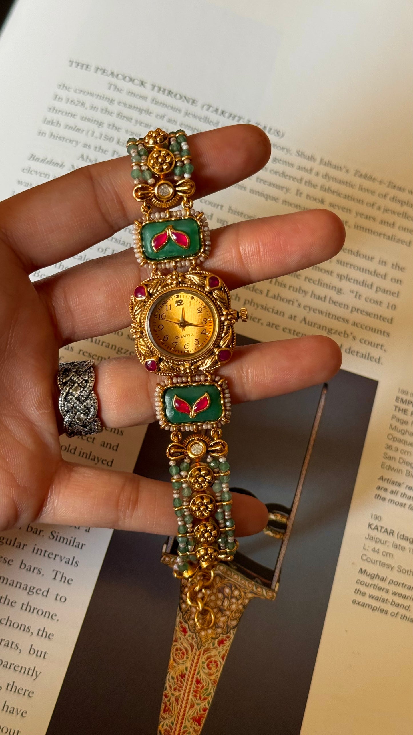 Emerald inlay golden dial rajwada watch