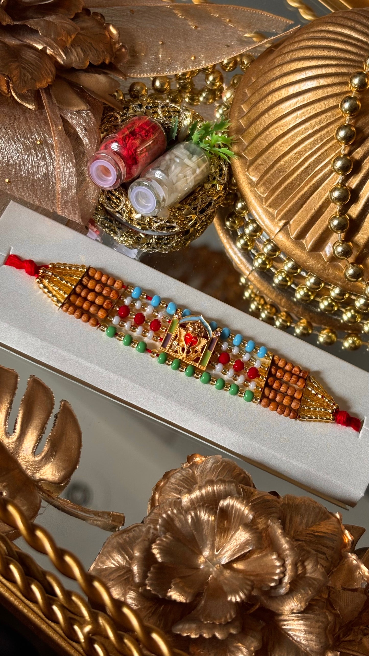 Lord ganesha multicoloured rakhi ( shipping will be extra )