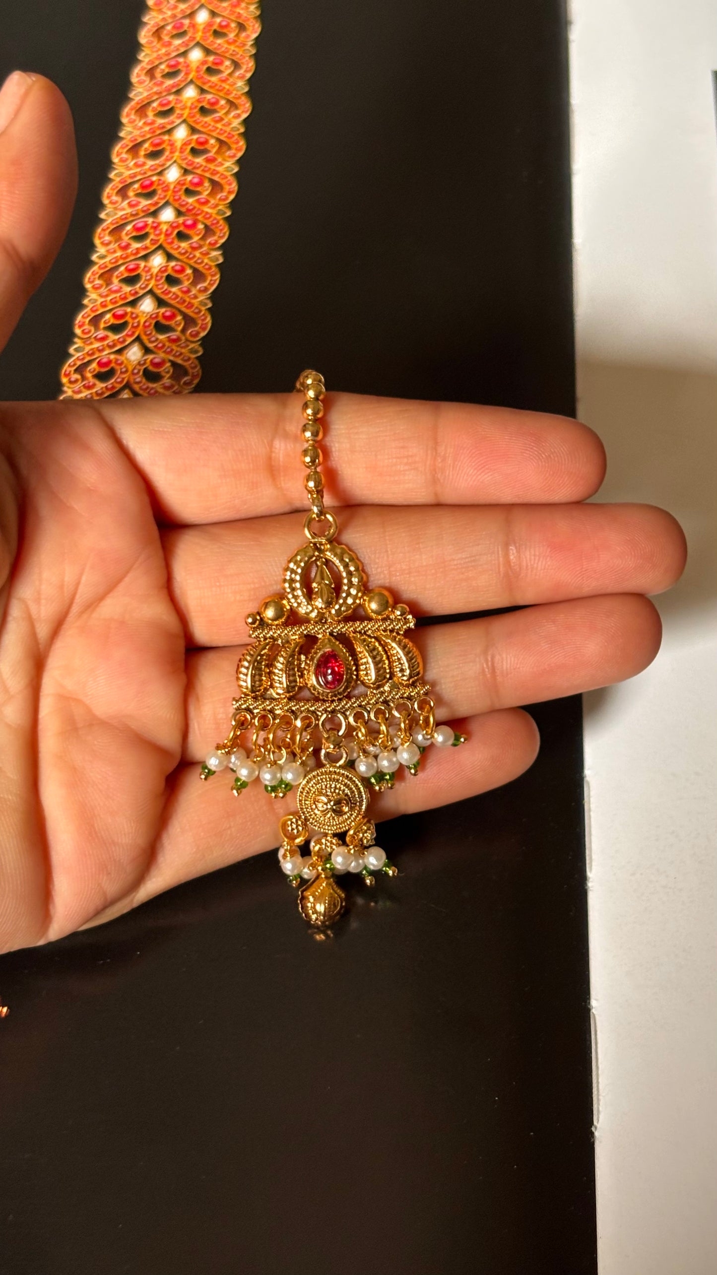 Ruby rajwada golden with pearl detailing maangtikka