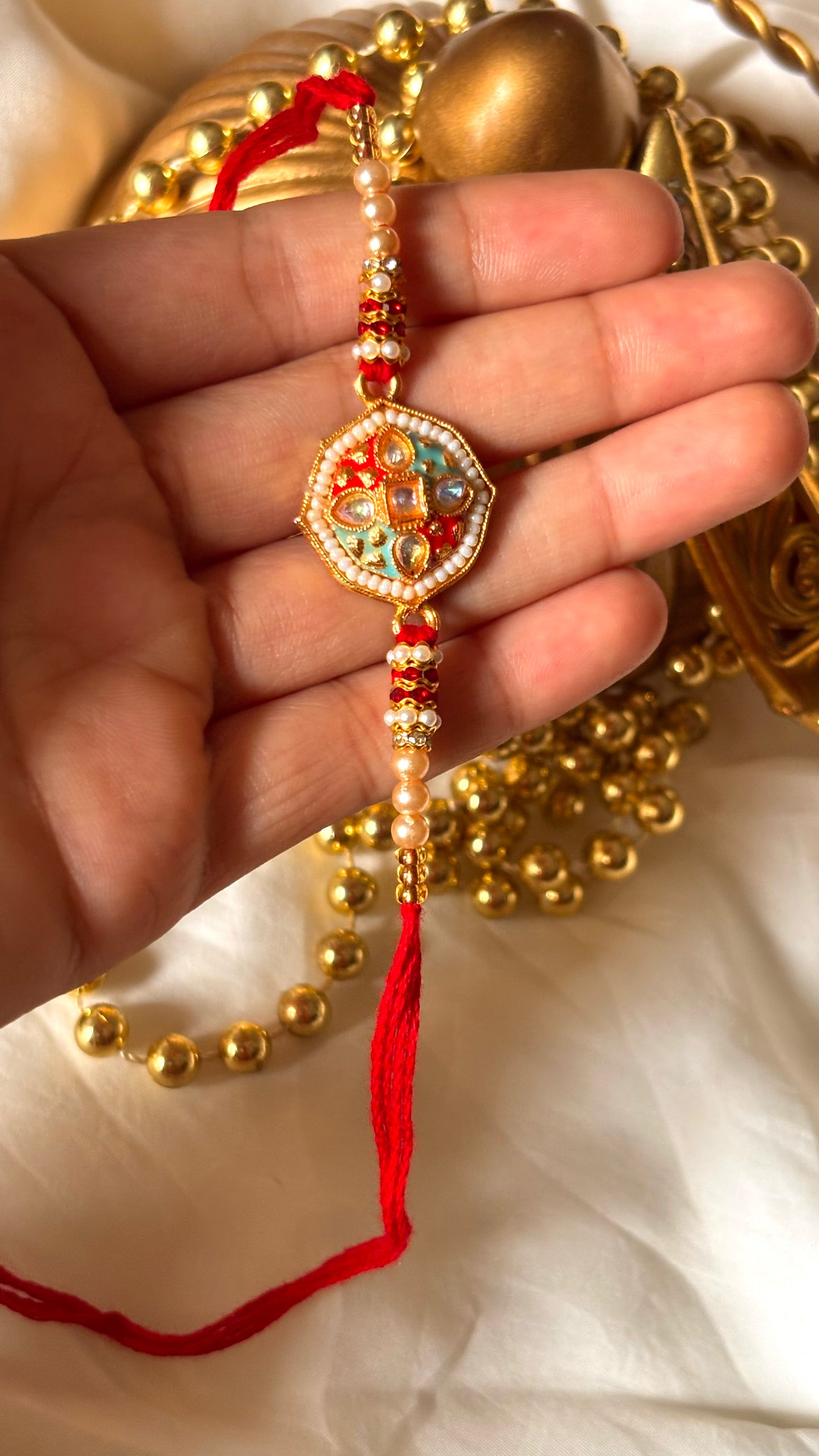 Red & firoza meenakari Kundan designer Rakhi ( shipping will be extra )