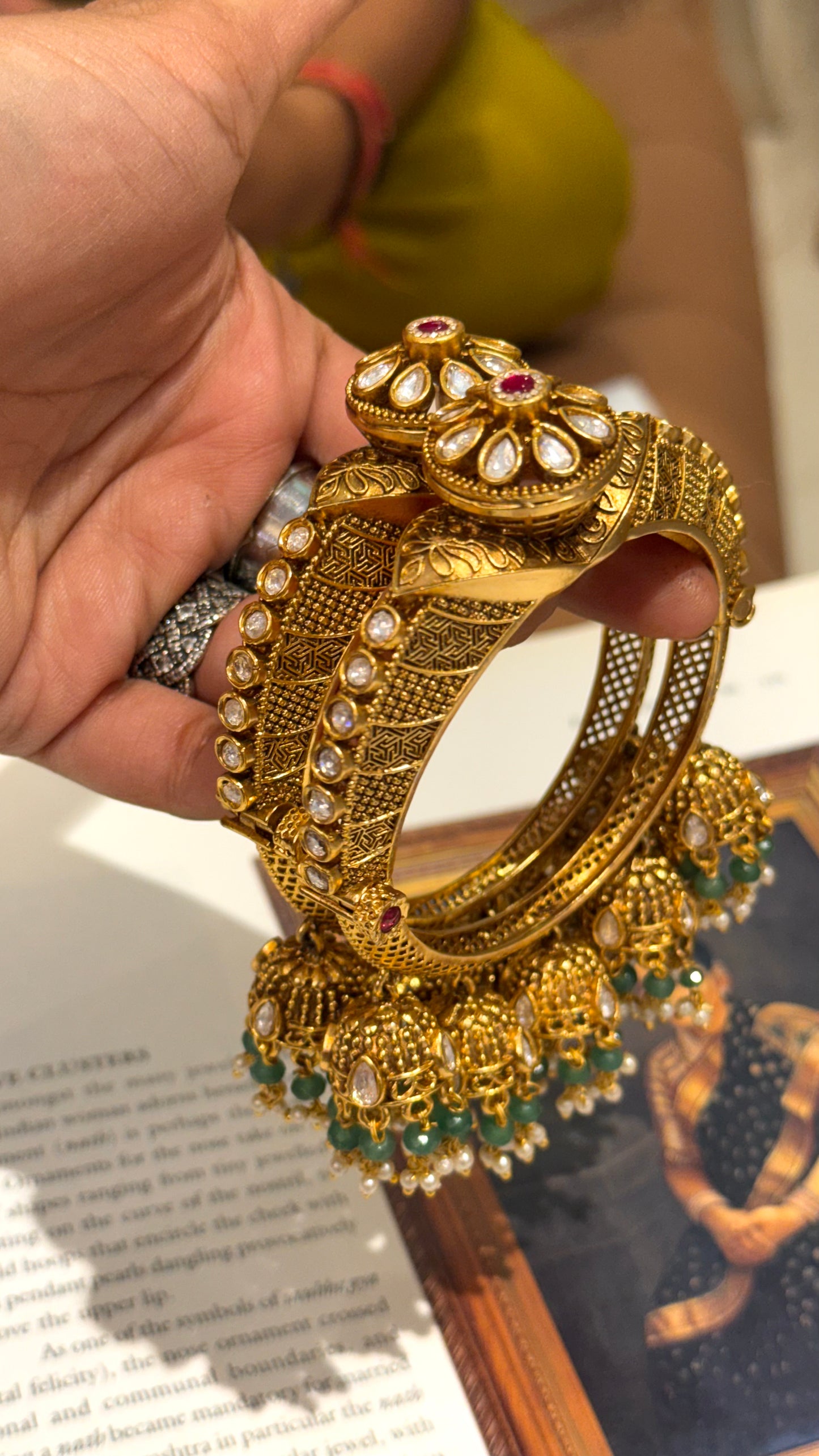 Rajwasa floral pattern bangles with rani pink stone and jhumki details