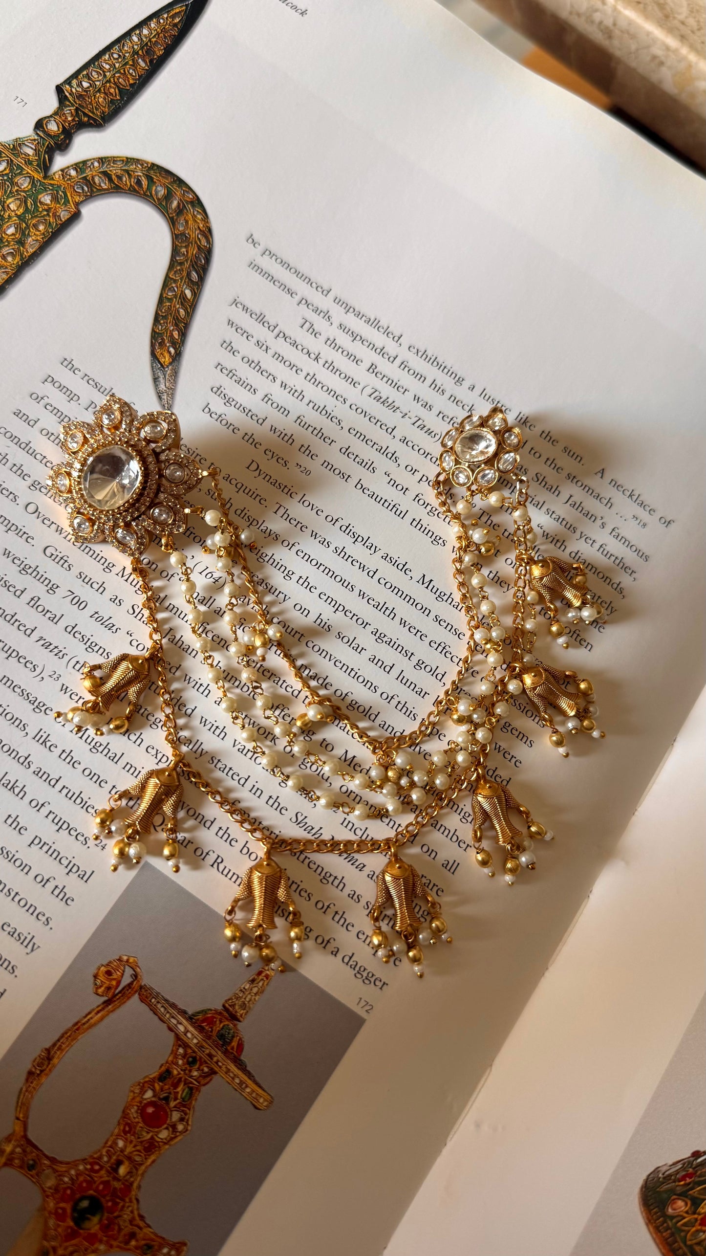 Floral studs attached with fish drops Kaanchain