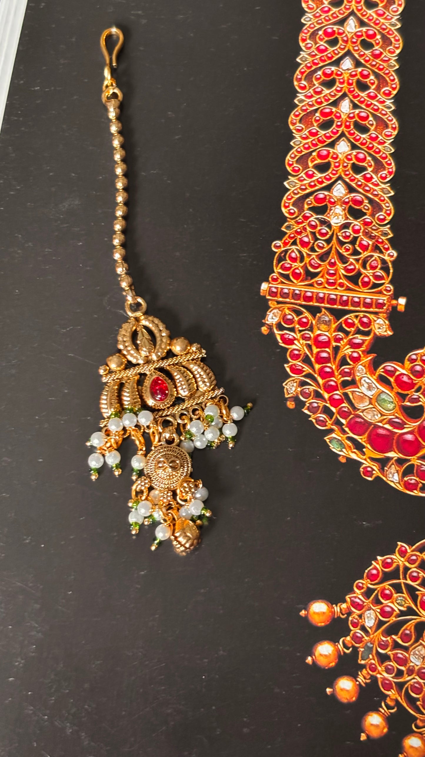 Ruby rajwada golden with pearl detailing maangtikka
