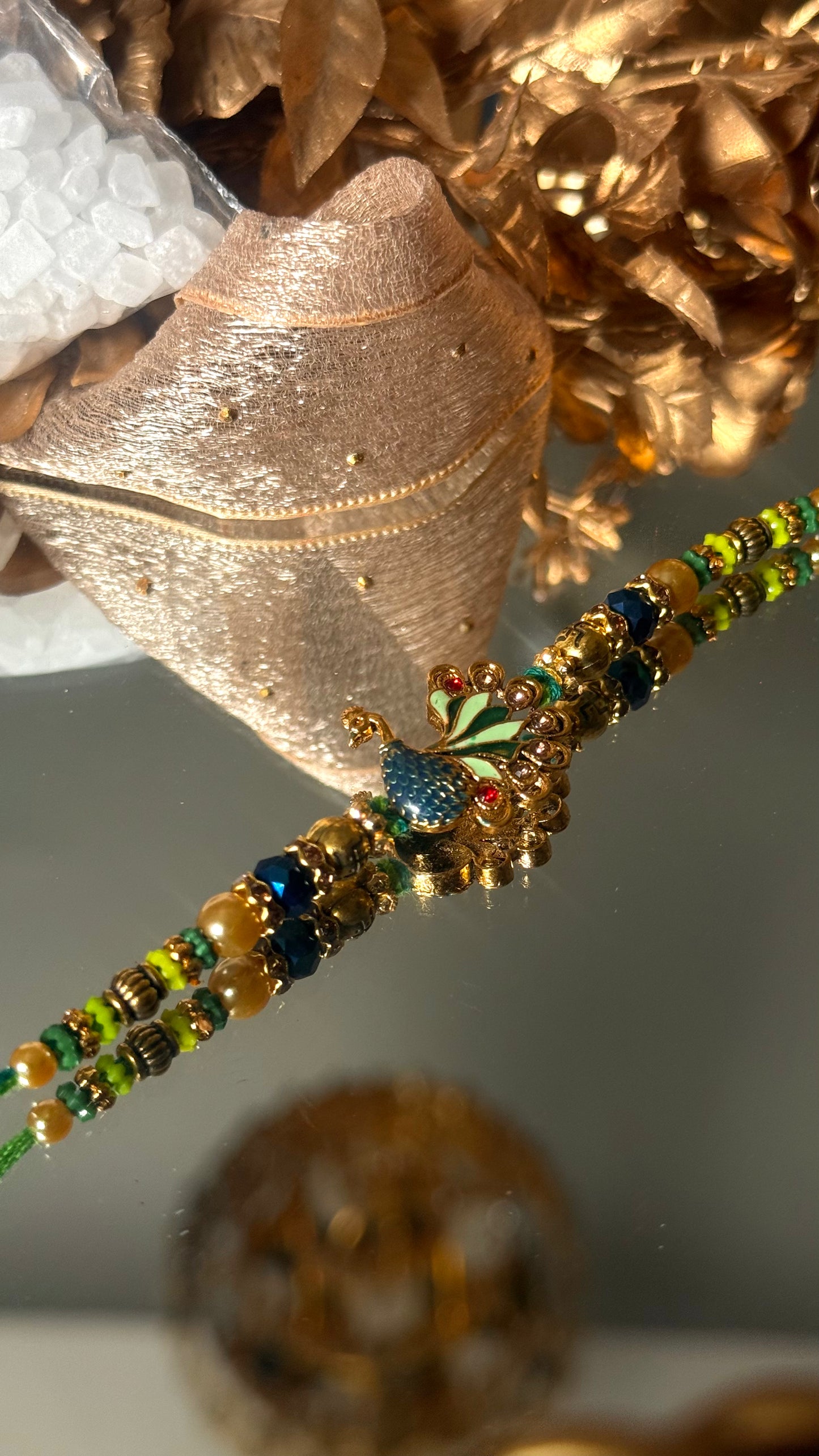 Peacock inspired nakashi rakhi