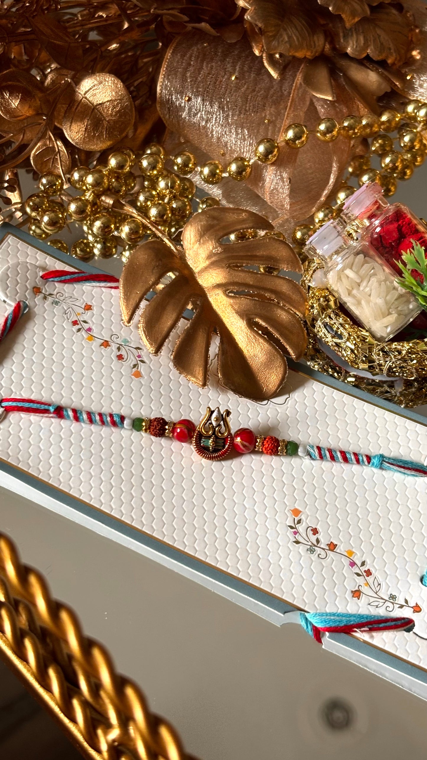 Lord shiva inspired rudraksh rakhi (red&blue) (shipping will be extra)