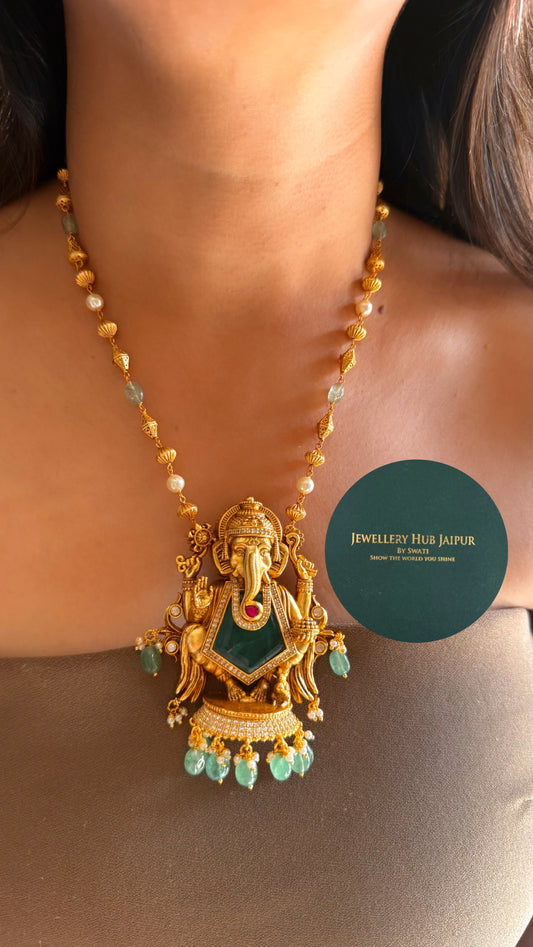 Ganeshji inspired emerald with mint drop Pendant set