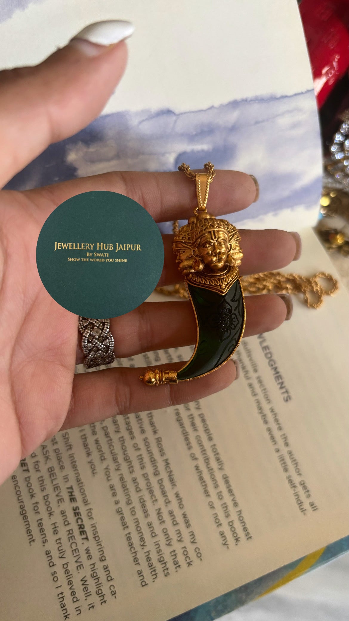 Three faces emerald pendant