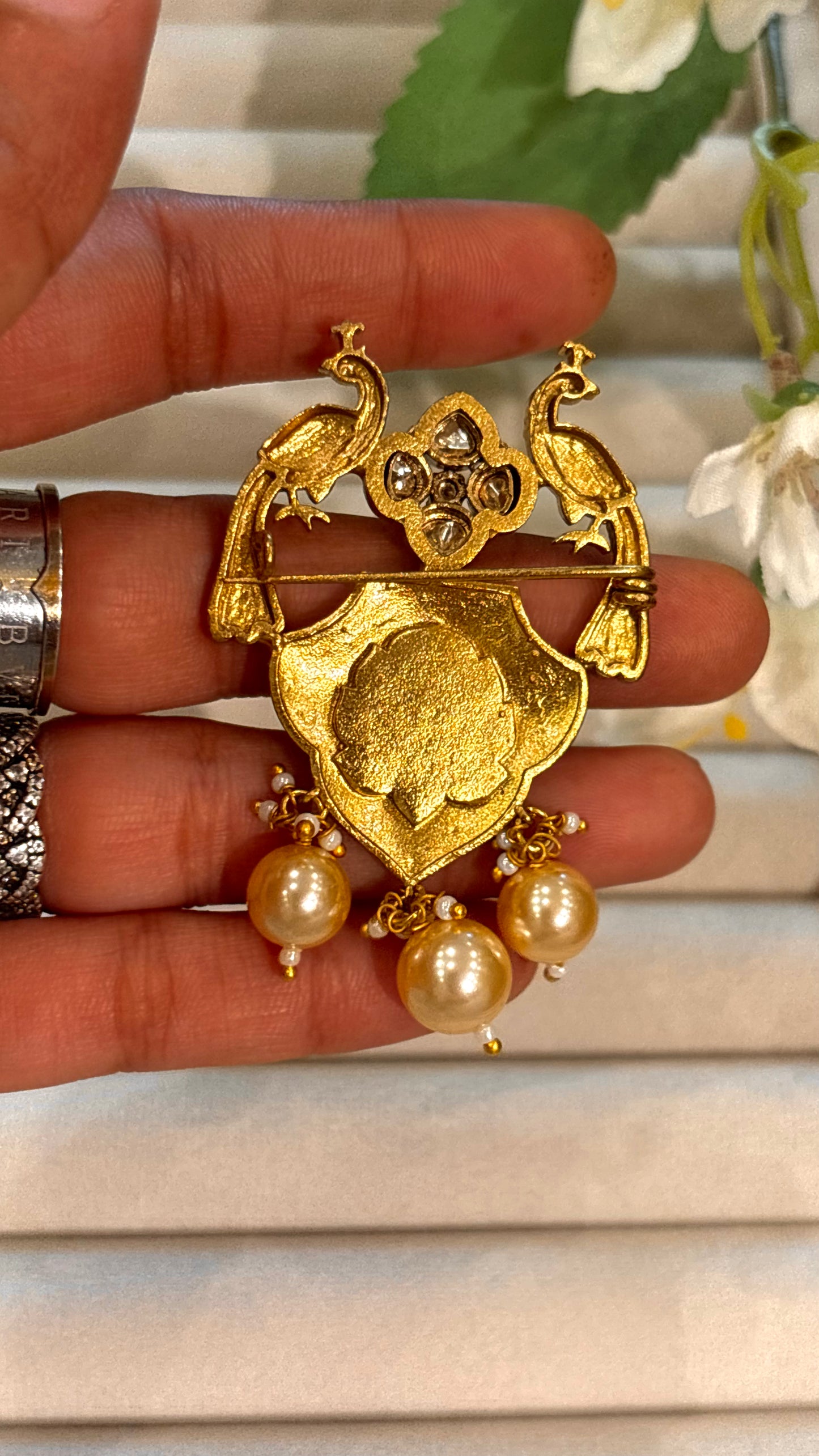 Peacock designer gold brooch