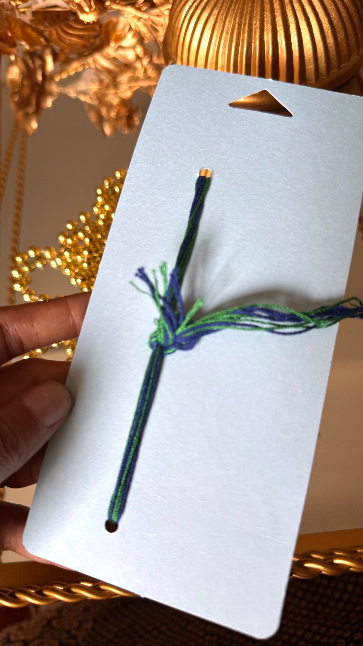 Peacock inspired silver metal rakhi