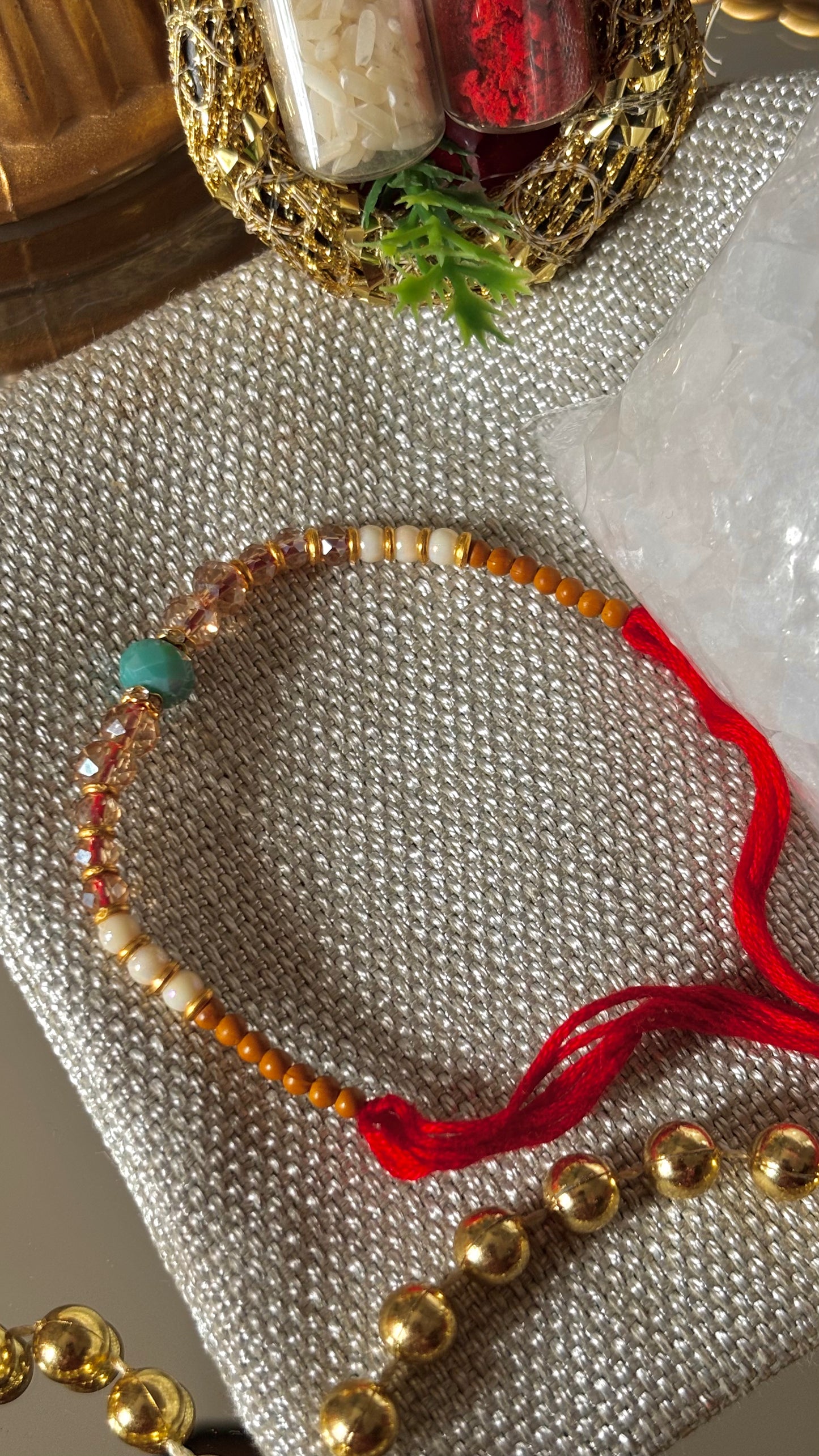 Firoza thread rakhi (shipping will be extra )