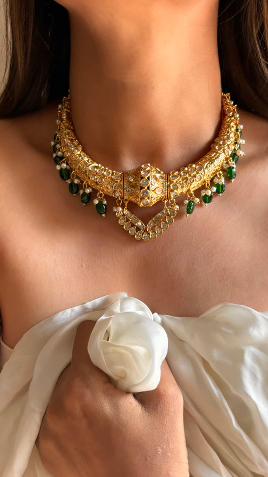 Gold meenakari hasli in emerald with earrings
