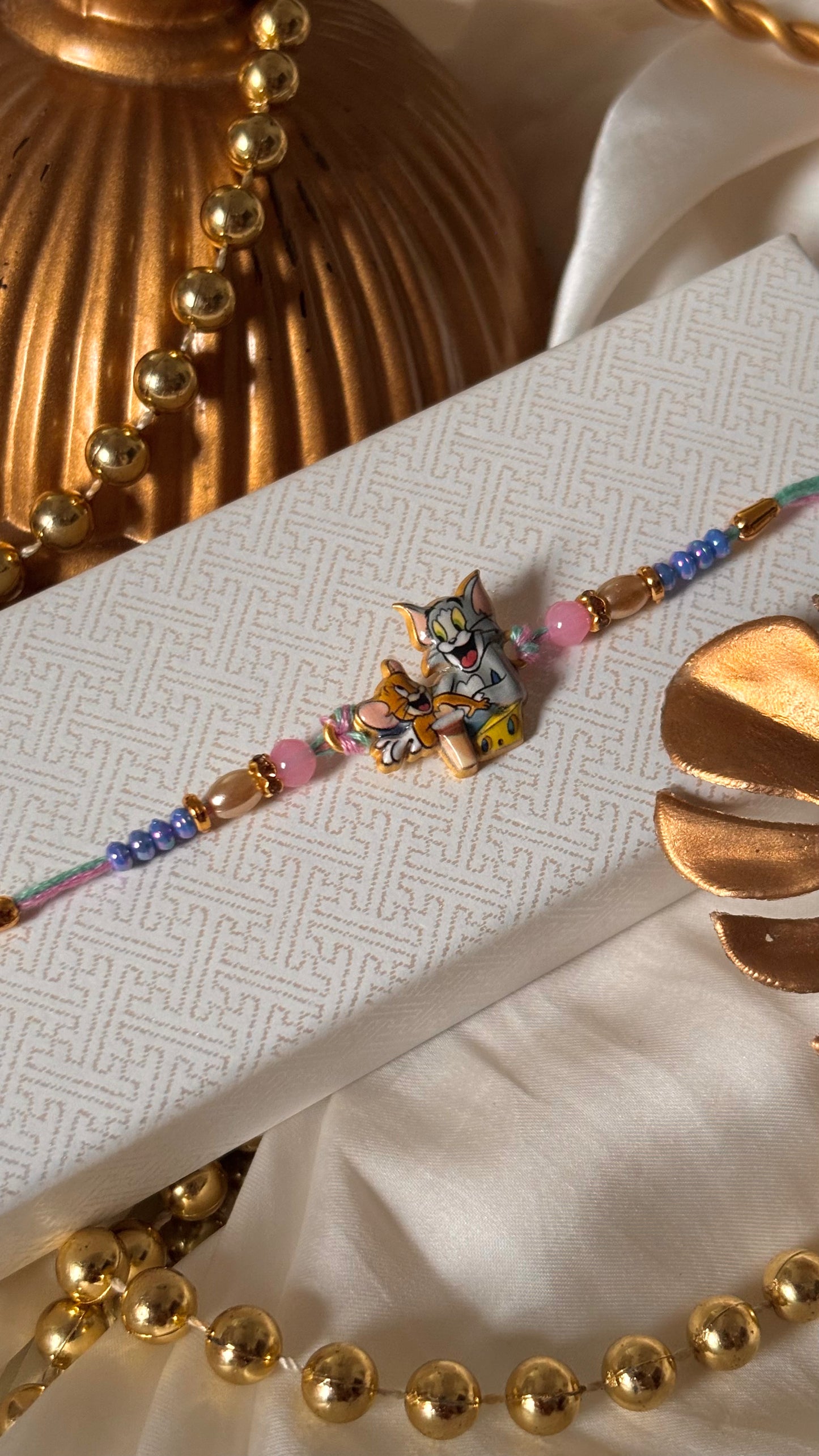 Tom & Jerry rakhi for kids ( shipping will be extra )